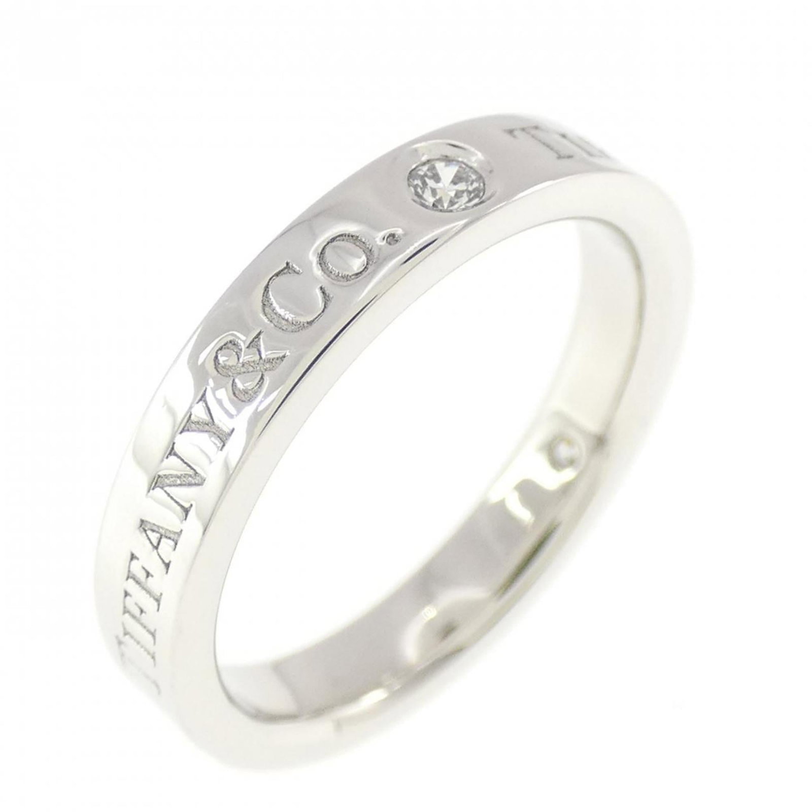 Platinum Ring Band Tiffany: Platinum Ring Band Tiffany Platinum Ring Band Tiffany features a stunning diamond set in a sleek platinum band, available in US size 3.5 and JP size 6.0. This elegant ring showcases the beauty of
