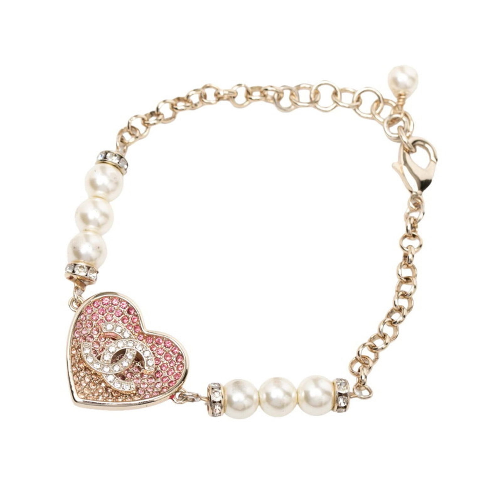 Charm bracelet enamel by Chanel: Charm bracelet enamel by Chanel Chanel's charm bracelet boasts a striking gold finish and elegant pink enamel, complemented by a luminous pearl and rhinestone accent. The delicate design measures 19.5