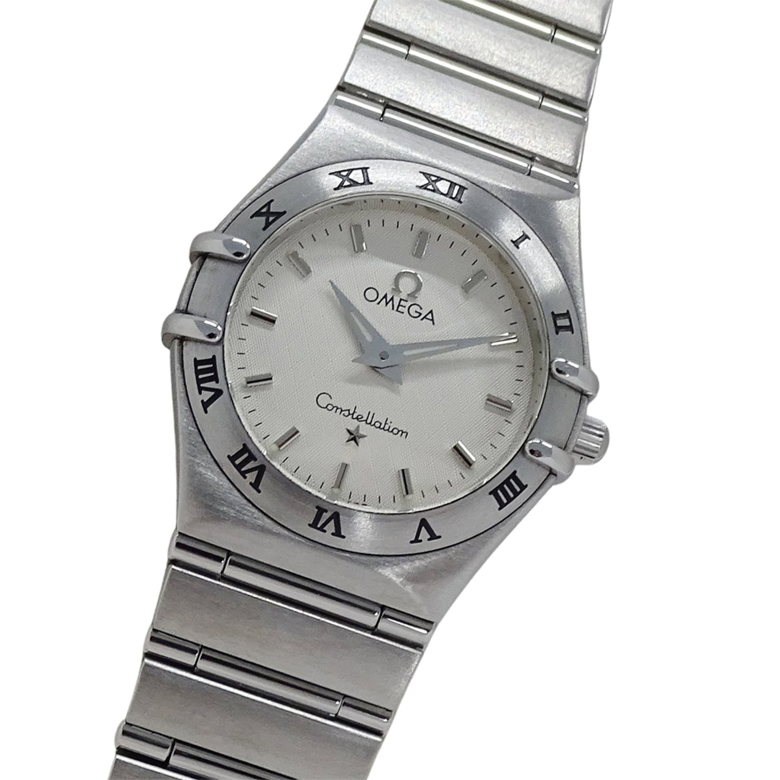 Wristwatch of Omega: Wristwatch of Omega Stainless steel case and band provide a sleek, modern look for the Omega wristwatch. The white dial stands out against its minimalist background, while the quartz movement ensures