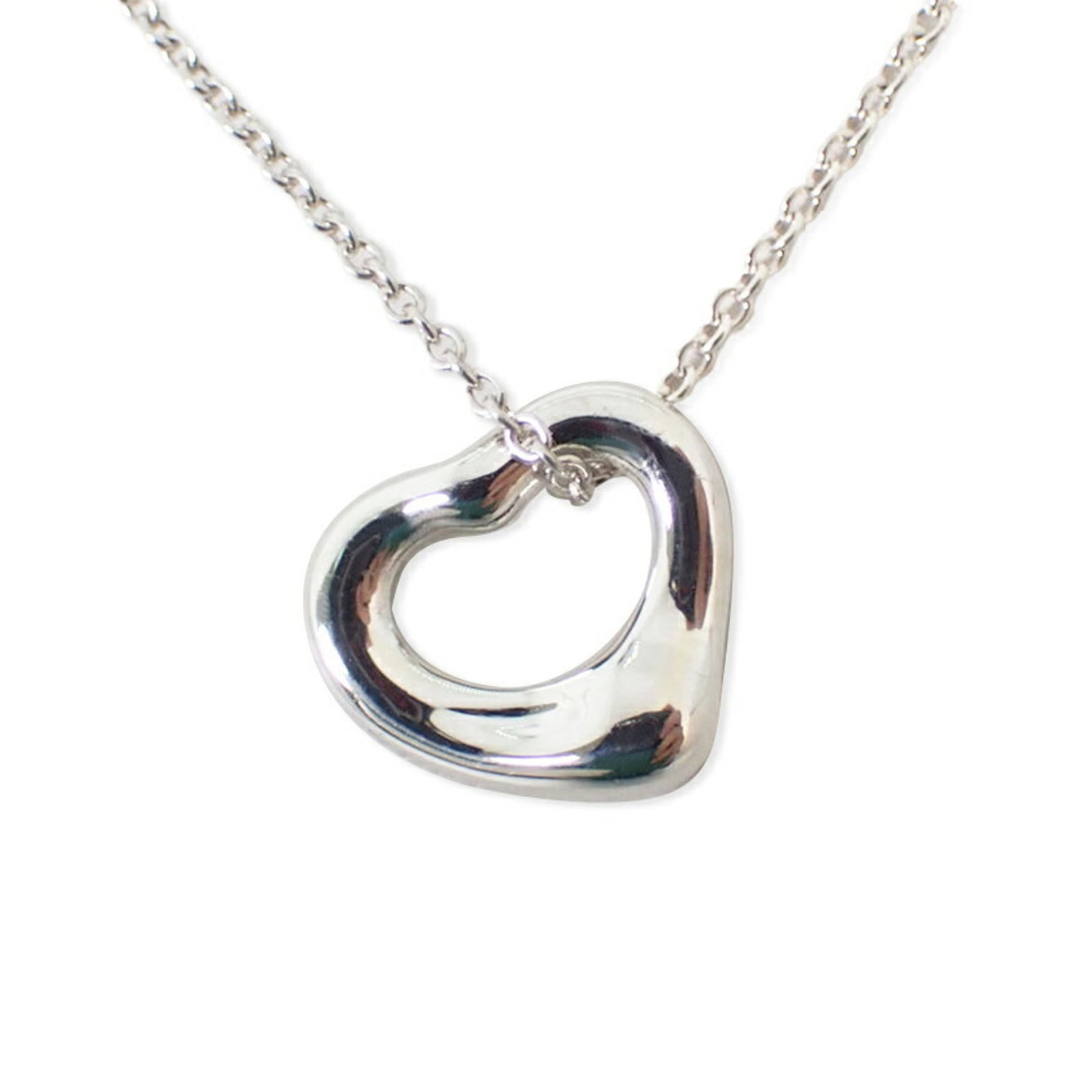 Ag925 Heart Pendant Necklace by Tiffany: Ag925 Heart Pendant Necklace by Tiffany Sterling silver 925 Ag925 Heart Pendant Necklace by Tiffany features a beautiful heart-shaped pendant, measuring 10mm x 11.2mm, suspended from a necklace with