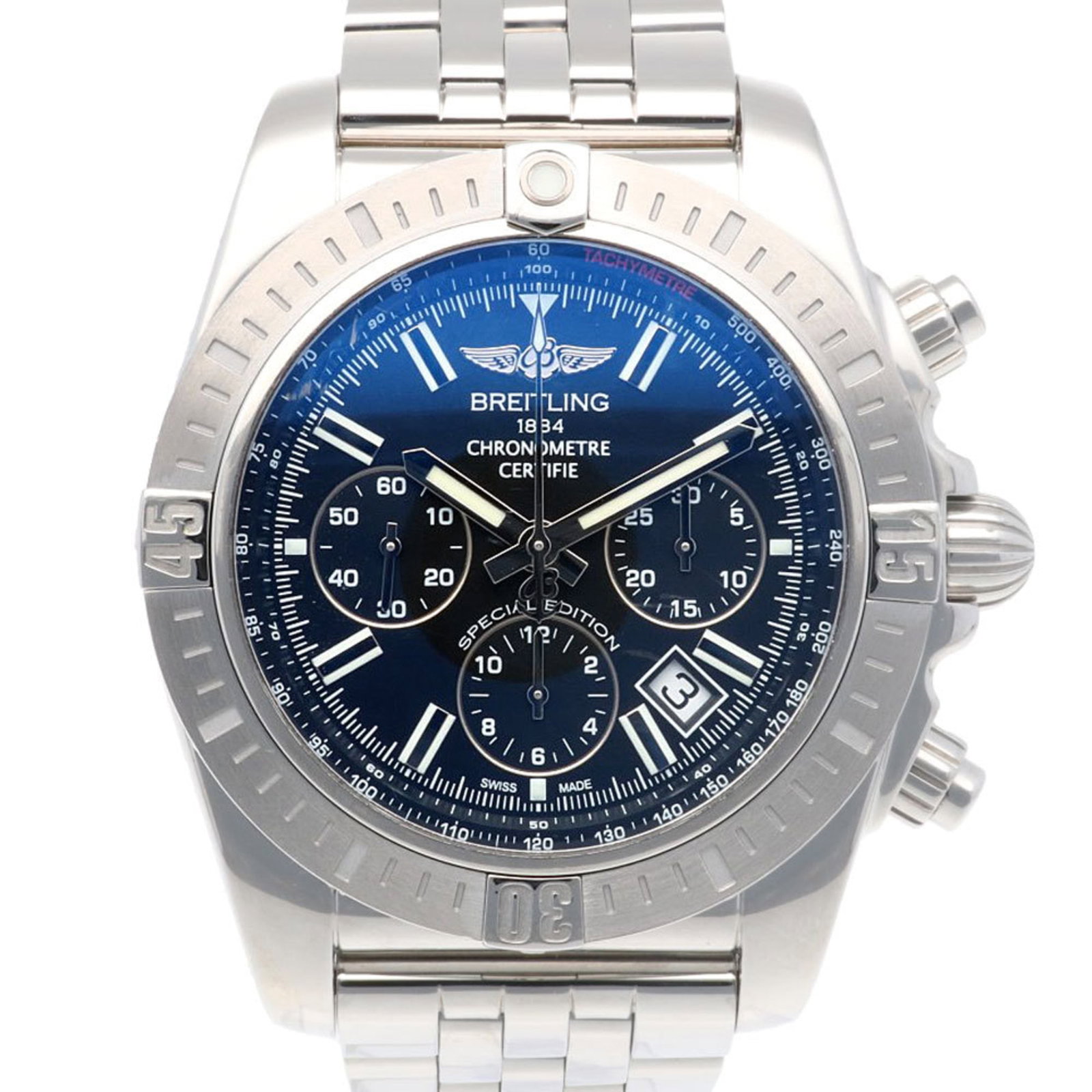 Breitling Wristwatch: Breitling Wristwatch The Breitling Chronomat wristwatch boasts a sleek silver case, navy dial, and stainless steel band, making it an elegant accessory for everyday wear. This self-winding automatic