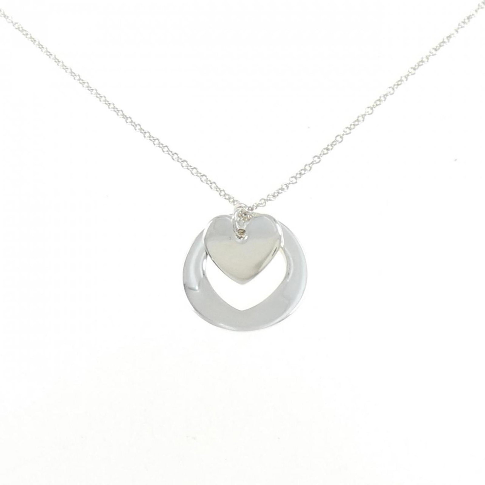 Heart Double Stencil Tiffany Necklace: Heart Double Stencil Tiffany Necklace Silver Heart Double Stencil Tiffany Necklace with intricate details and a classic design, measuring 15.1mm x 15.1mm, fits comfortably around the neck with a