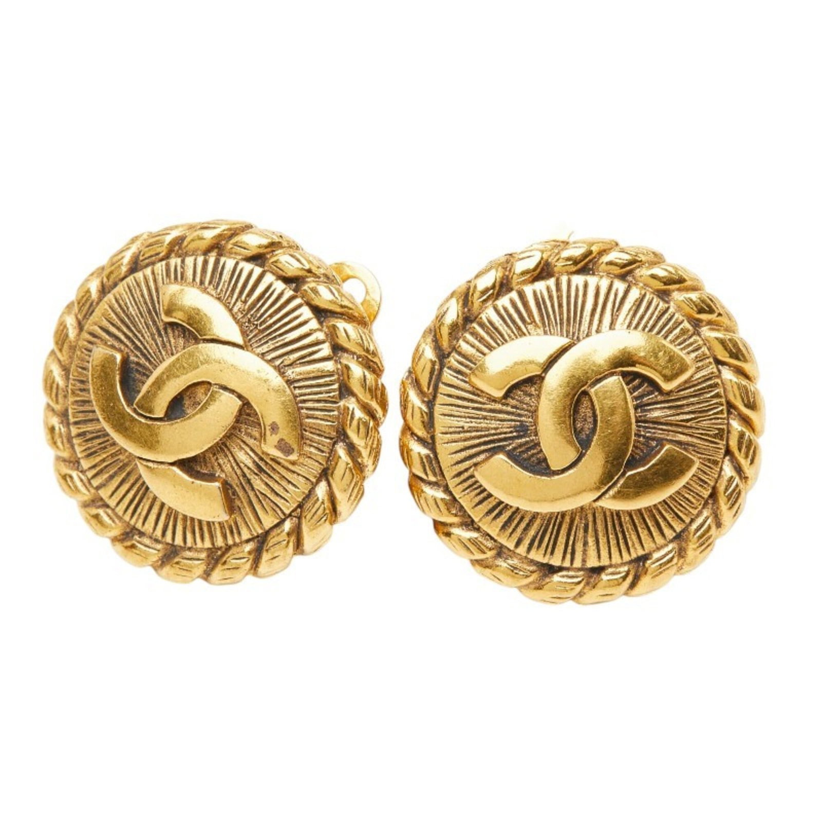 Clip earrings by Chanel: Clip earrings by Chanel Clip earrings by Chanel, crafted in gold and measuring 23.10mm x 22.80mm, showcase the brand's attention to detail and timeless design. These elegant accessories are a