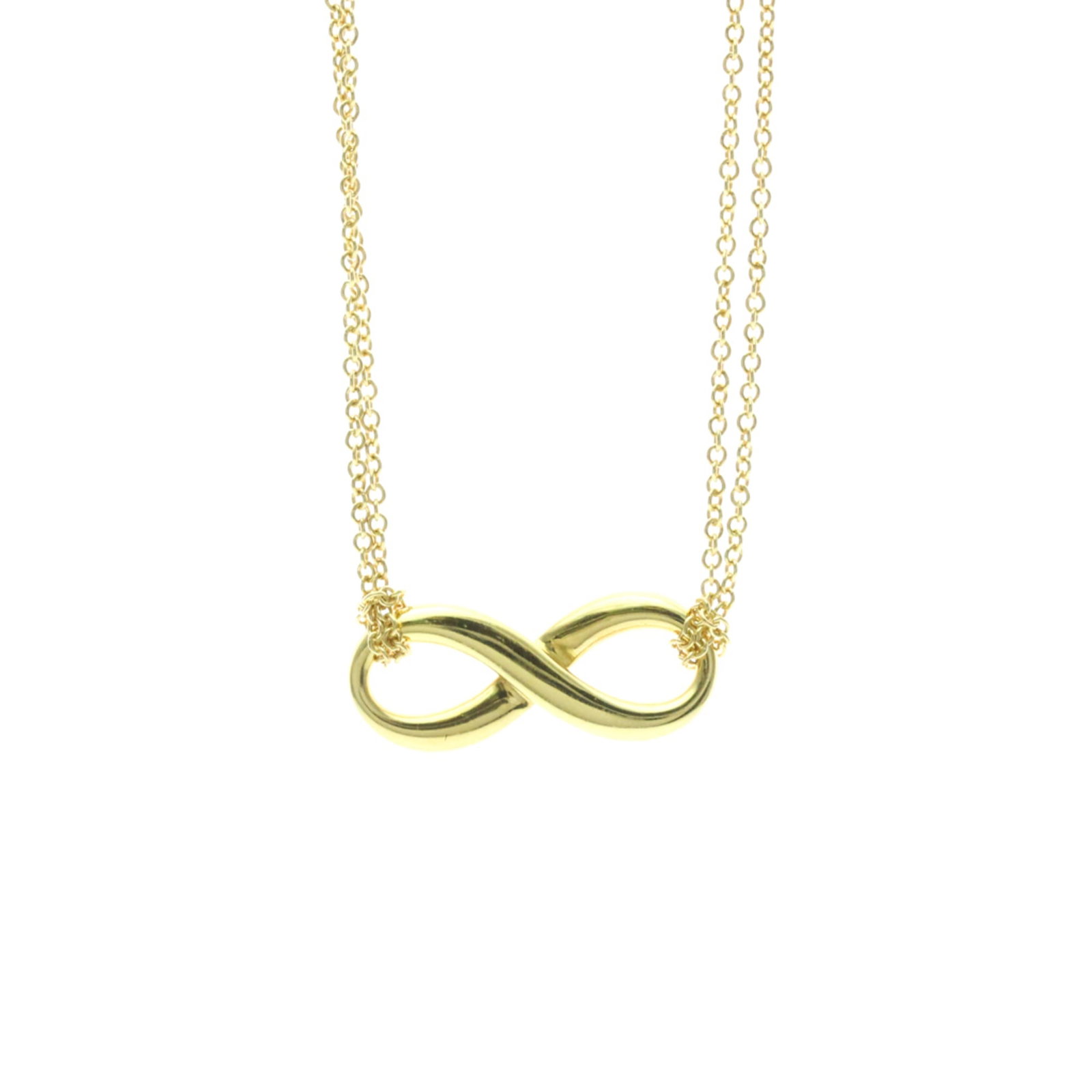 Tiffany Infinity Yellow Gold (18K) No Stone Menwomen Fashion Pendant Necklace (Gold): Tiffany Infinity Yellow Gold (18K) No Stone Menwomen Fashion Pendant Necklace (Gold) Tiffany Infinity Yellow Gold (18K) No Stone Menwomen Fashion Pendant Necklace features a sleek, 8.5mm x 21.3mm