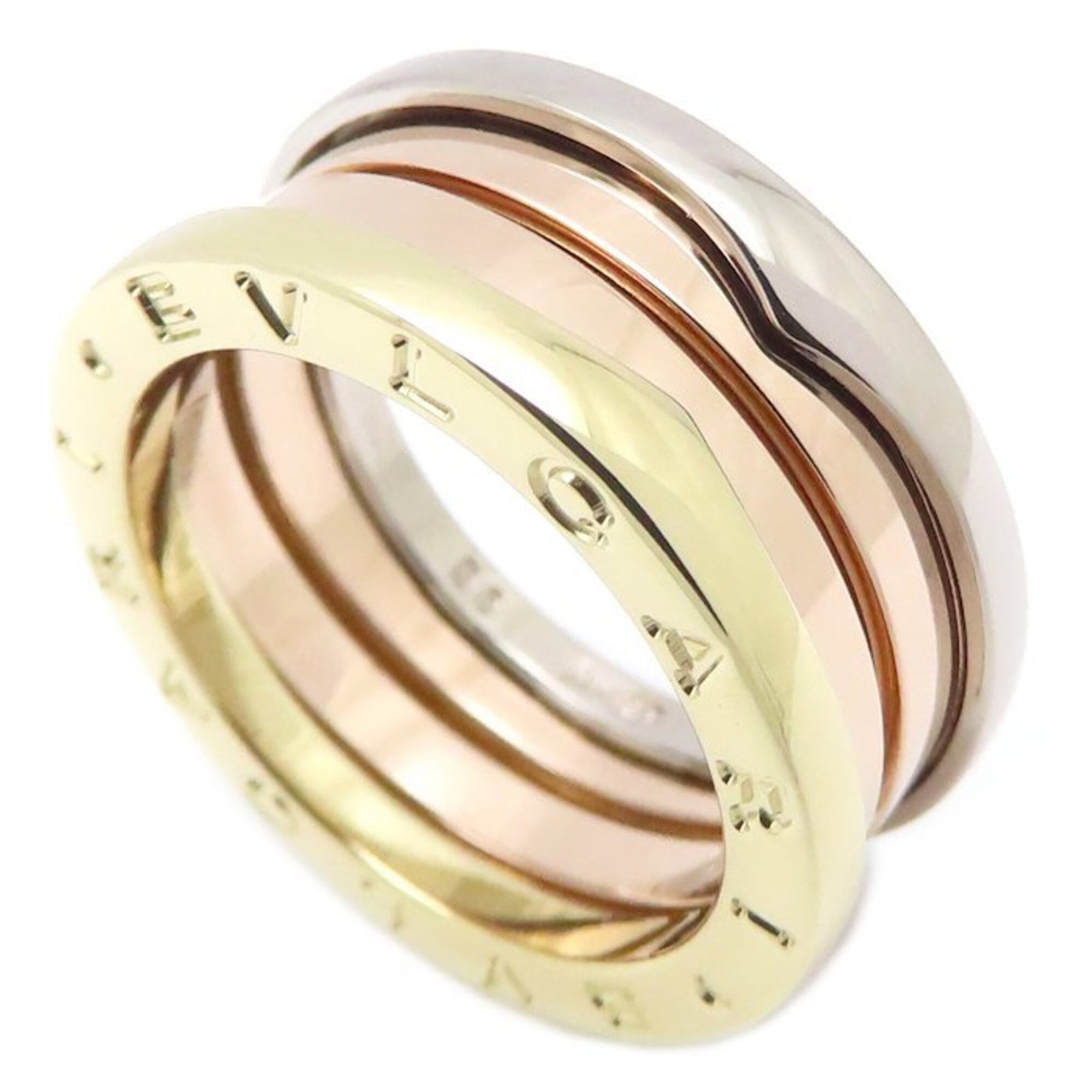Pink Gold 18k Yellow Gold 18k White Gold 18k Bvlgari Band Ring: Pink Gold 18k Yellow Gold 18k White Gold 18k Bvlgari Band Ring Pink gold, white gold, and yellow gold come together in this striking Bvlgari band ring. The combination of these precious metals