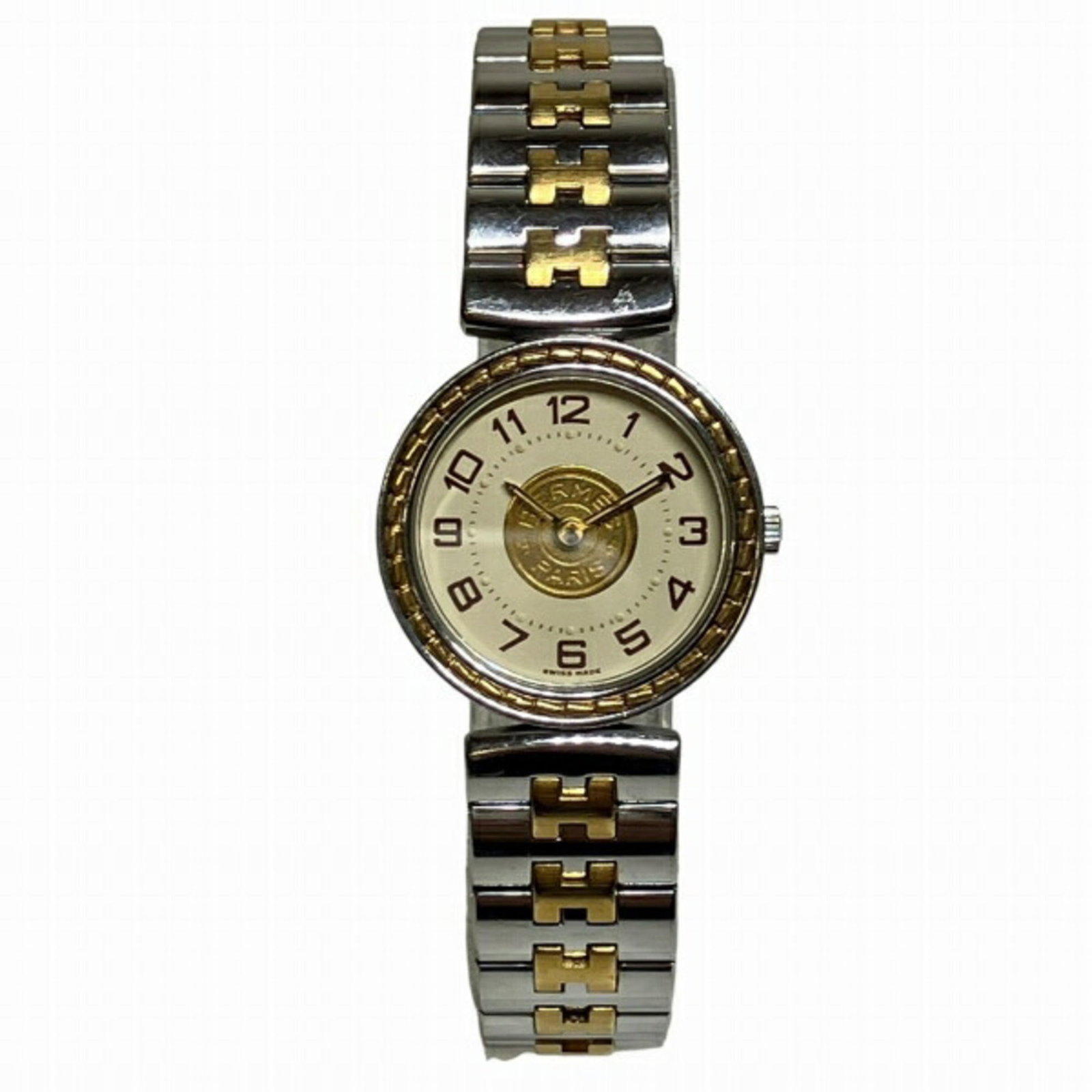 Hermes Wristwatch: Hermes Wristwatch Stainless steel case and band provide a sleek, modern look for the Hermes wristwatch. The white dial stands out against its minimalist design, while quartz movement ensures reliable