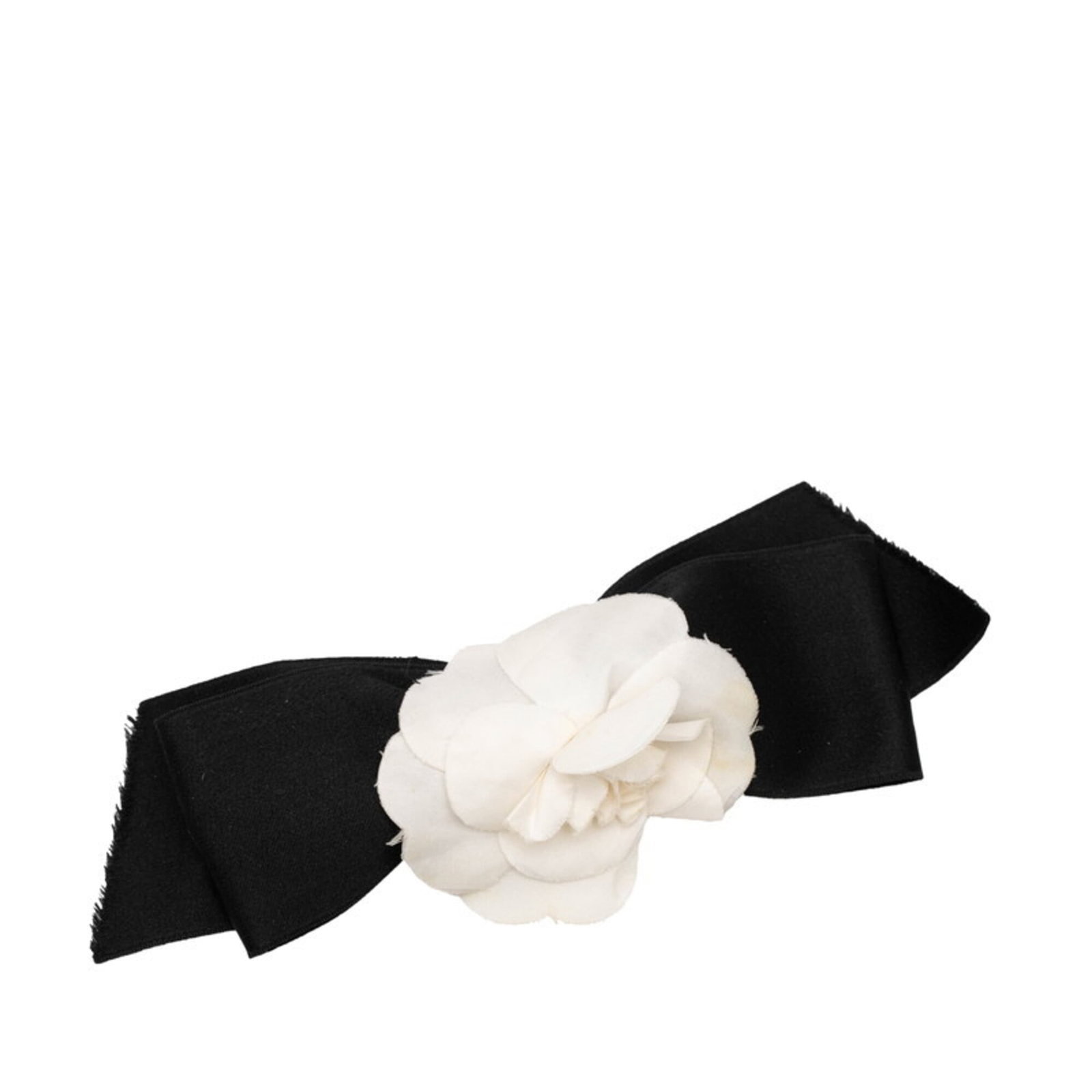 Metal Chanel Brooch: Metal Chanel Brooch Metal Chanel Brooch - A sleek and sophisticated accessory from the iconic French fashion house, featuring a striking black and white metal design. Standing at 8cm x 21.5cm, this