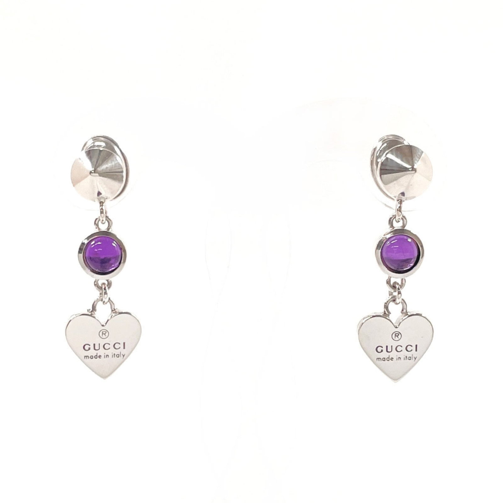 Stud Earrings Silver Gucci 925: Stud Earrings Silver Gucci 925 Stud earrings from Gucci, made in Italy with silver 925 material. Featuring purple and silver stone, these earrings measure 25.00mm x 8.00mm / 0.98'' x 0.31''. The