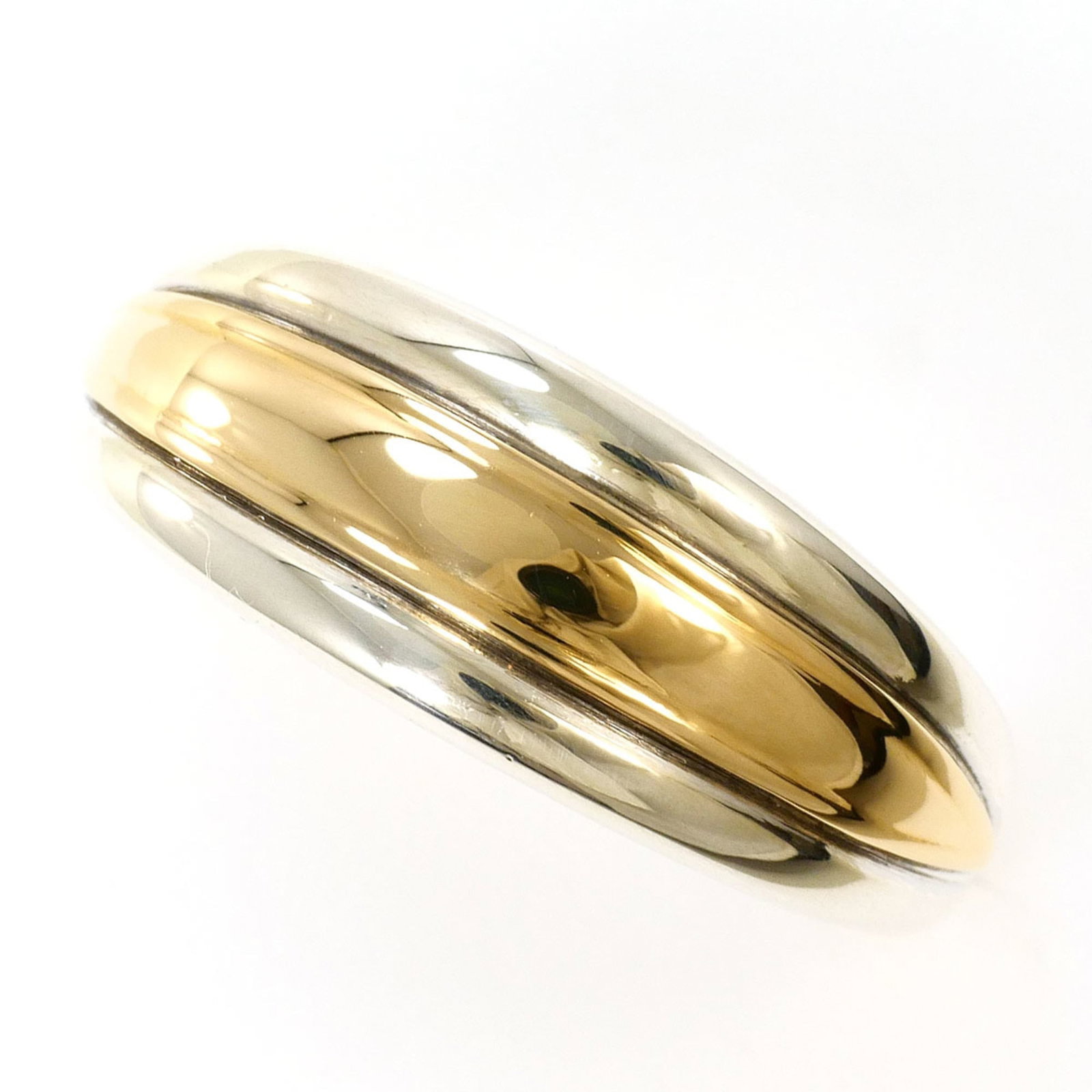Unbranded Band Ring Silver 925 Yellow Gold (10K): Unbranded Band Ring Silver 925 Yellow Gold (10K) Silver and yellow gold band ring with a 10K metal purity, featuring a 925 silver and 10K yellow gold combination. This 8mm wide ring weighs