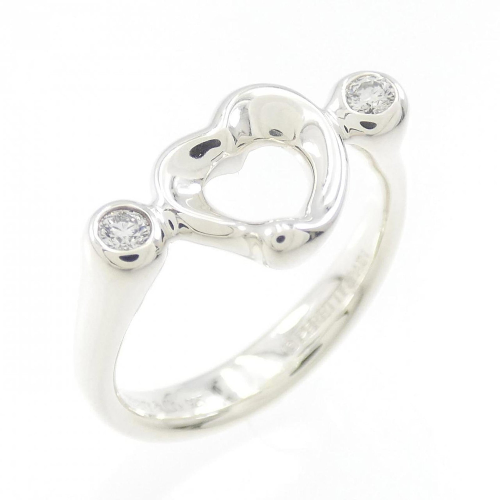 Silver 925 Tiffany Band Ring: Silver 925 Tiffany Band Ring Silver 925 Tiffany Band Ring, featuring a diamond stone and made from high-quality silver. This elegant band ring is available in US size 4.5 and Japanese size 8.0, making