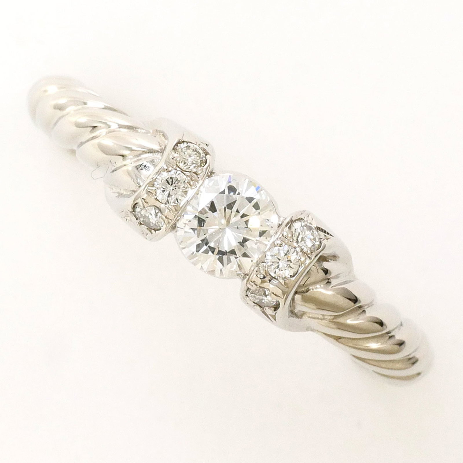 Ring Band Platinum Unbranded 900: Ring Band Platinum Unbranded 900 Platinum band ring features a diamond stone weighing 0.30 carats, set in a platinum metal construction with a US size 6.5 and JP size 12 fit. The ring measures 5mm in