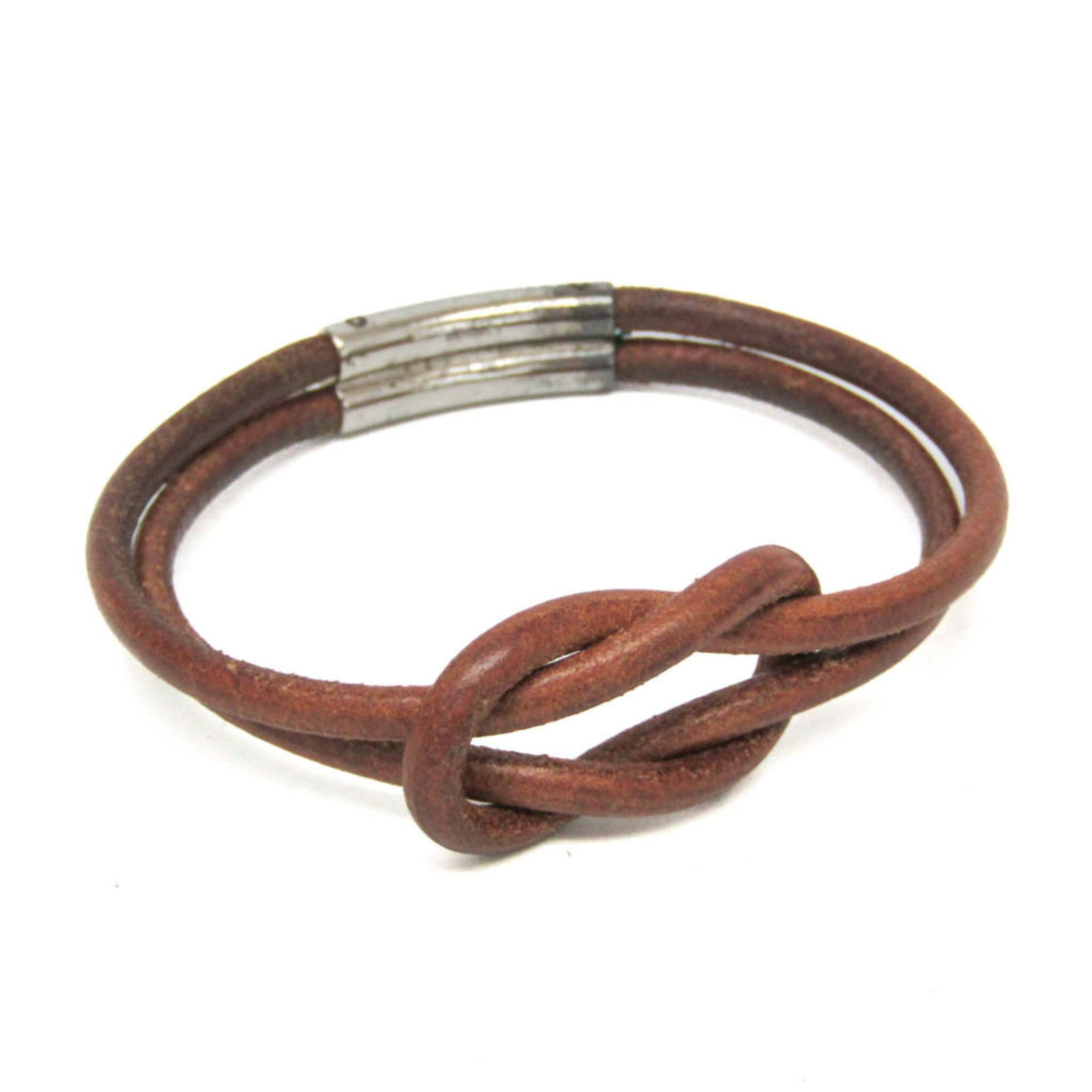 Leather metal bangle hermes: Leather metal bangle hermes Leather and metal bangle from Hermes, featuring a brown and silver design. Measuring 18cm in length with a width of 2cm, this bangle weighs 20g total. Made from
