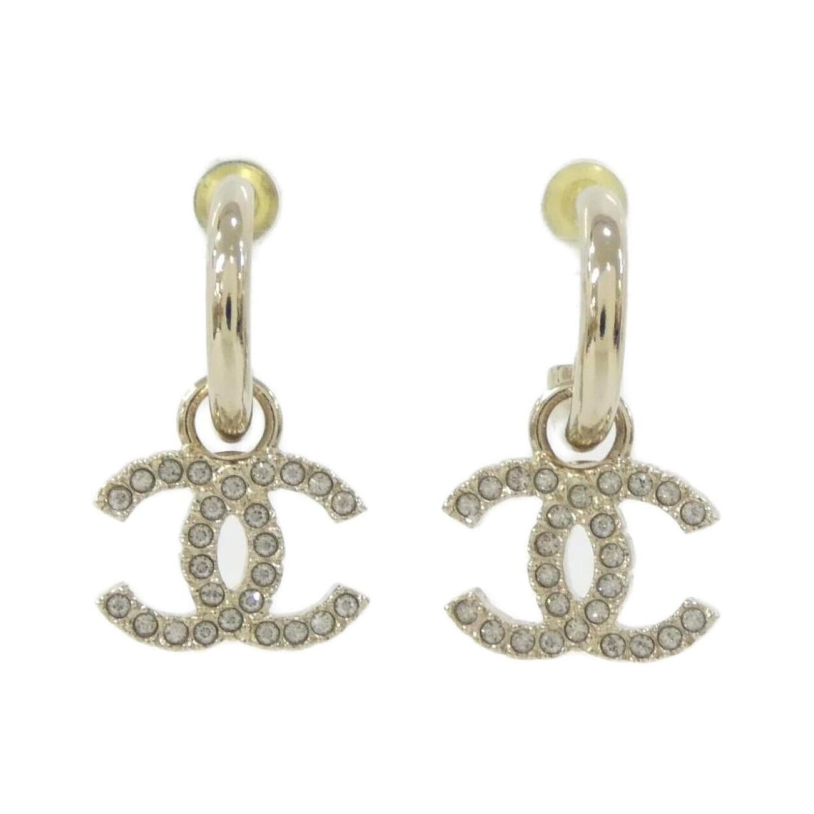 Chanel Stud Earrings: Chanel Stud Earrings Chanel's iconic stud earrings feature clear and gold details, measuring 26.00mm x 15.00mm in size. The minimalist design showcases the brand's signature style with a sleek, modern