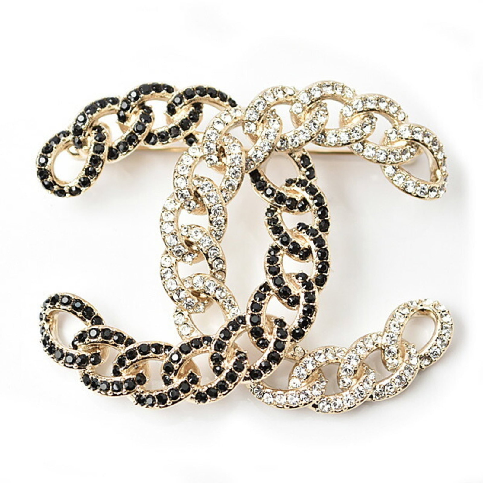 Brooch Pin Chanel: Brooch Pin Chanel Gold Brooch Pin by Chanel Features Rhinestone and Black Stone Details. This gold pin brooch from Italian designer Chanel showcases a striking combination of rhinestones and black sto
