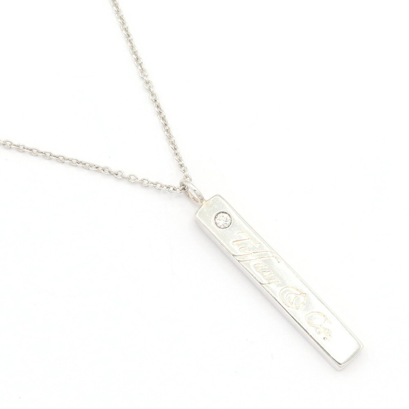 Tiffany & Co. Notes Bar Necklace 1P Diamond Sterling Silver 925 Pendant Choker Women'S.: Tiffany & Co. Notes Bar Necklace 1P Diamond Sterling Silver 925 Pendant Choker Women'S. Sterling silver 925 pendant choker necklace from Tiffany & Co. features a 1P diamond set in a sleek design,