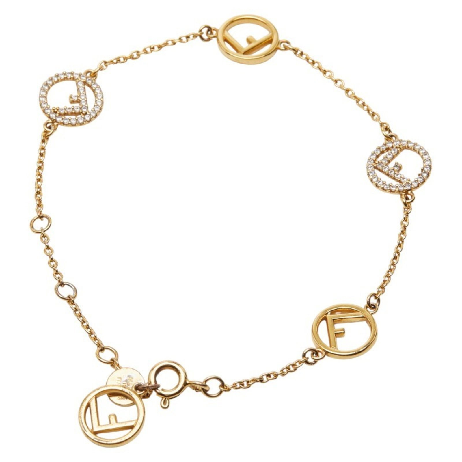 Fendi Charm Bracelet Gold Plating: Fendi Charm Bracelet Gold Plating Gold plating gives this Fendi charm bracelet its luxurious look, while rhinestone stones add a touch of glamour. The 19cm length makes it a versatile accessory that