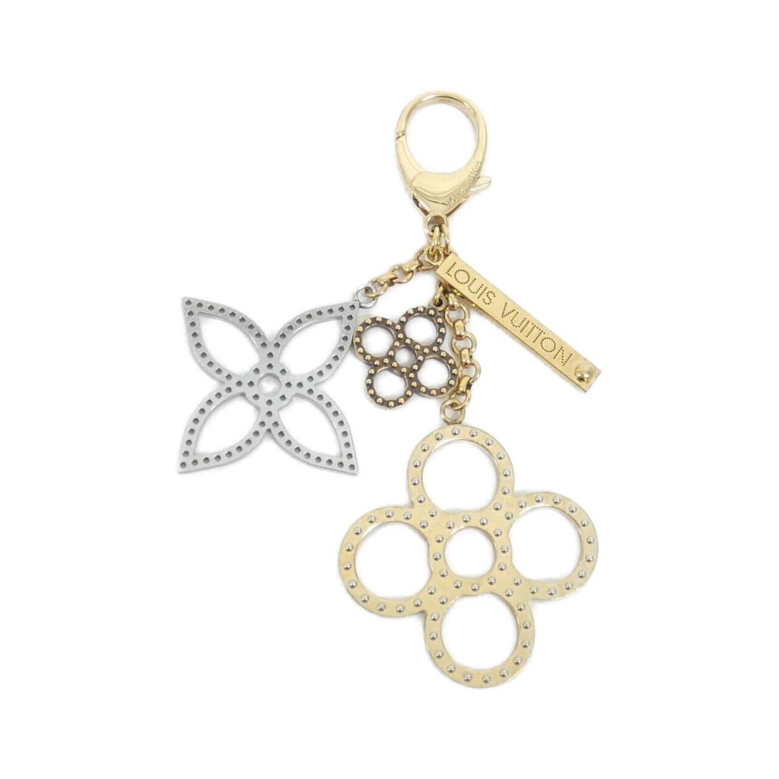 Louis Vuitton Handbag Charm: Louis Vuitton Handbag Charm Gold and Silver Louis Vuitton Handbag Charms Available. This charm features the iconic Louis Vuitton brand, available in both gold and silver finishes. A stylish accessory