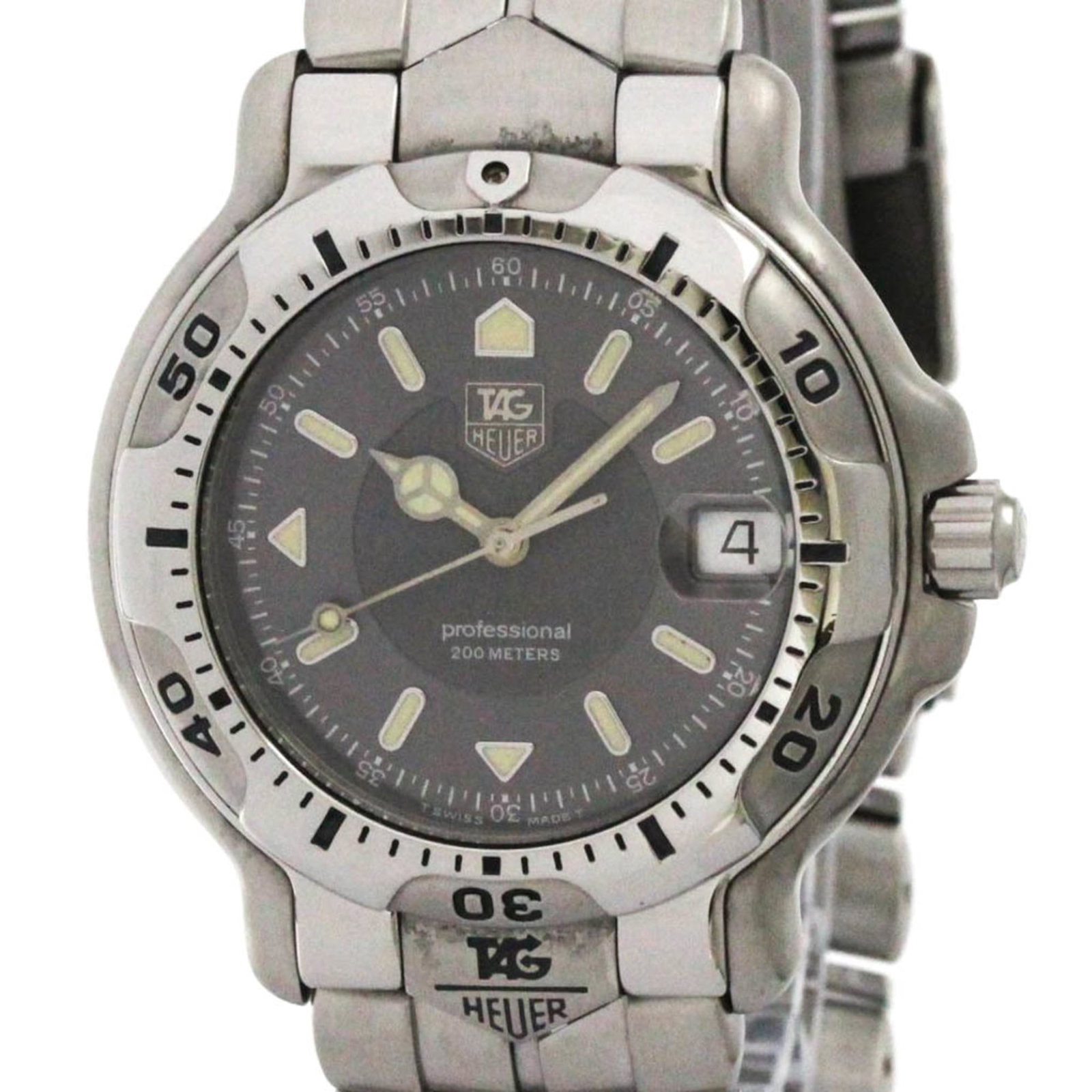 Wristwatch From Tag: Wristwatch From Tag Stainless steel case and band make for a sleek sporty look, while the gray dial provides a subtle contrast. The quartz movement ensures reliable timekeeping, and the date function 