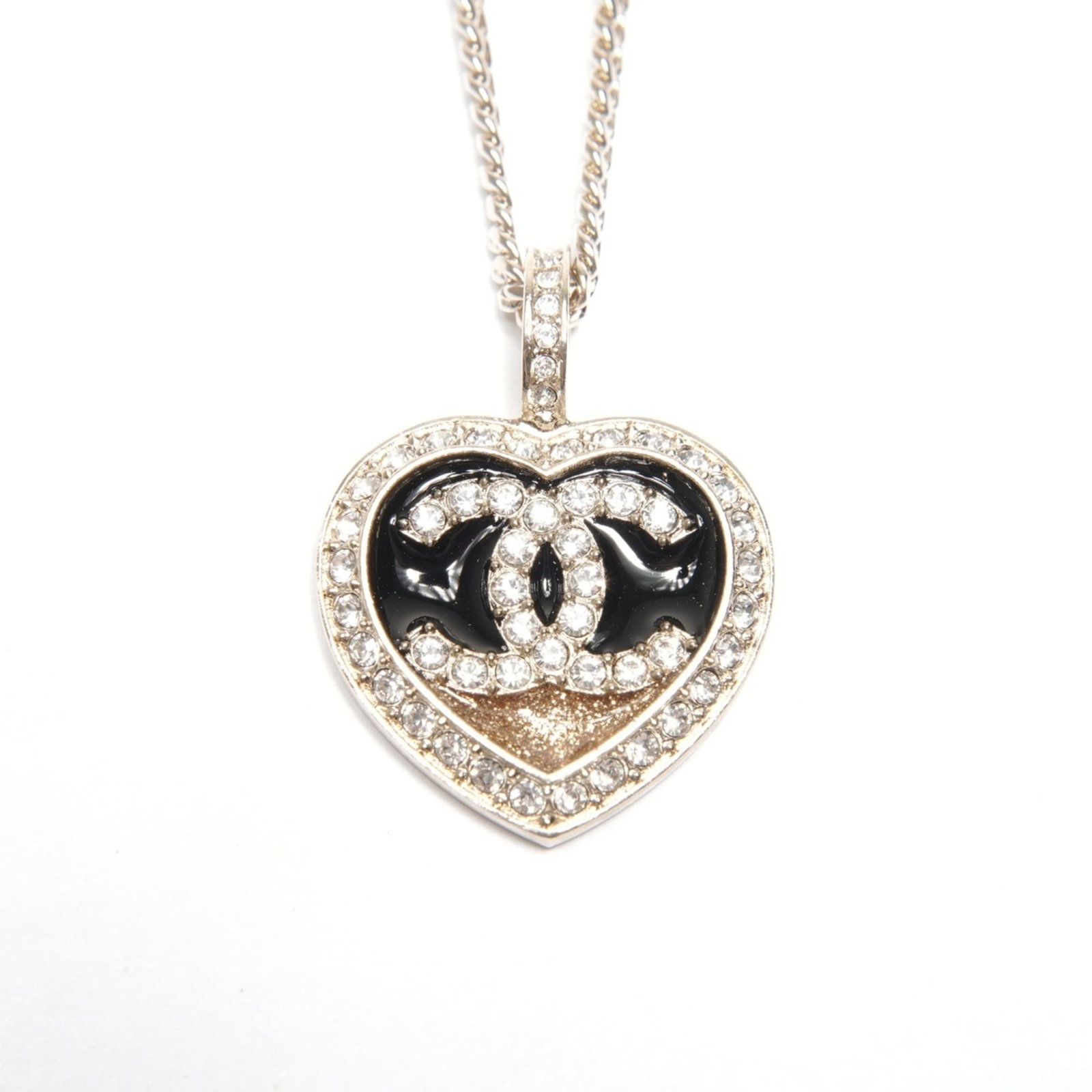 Chanel C23B Coco Mark Heart Rhinestone Necklace Gold Ws25122: Chanel C23B Coco Mark Heart Rhinestone Necklace Gold Ws25122 Gold Chanel C23B Coco Mark Heart Rhinestone Necklace measures 46 cm in circumference and features a 16mm x 18mm pendant. This gold