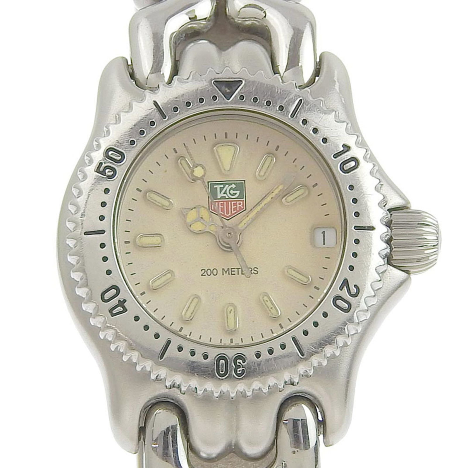 Wristwatch From Tag: Wristwatch From Tag Stainless steel case and band add a sleek touch to this silver Tag Heuer wristwatch, featuring a quartz movement for reliable timekeeping. Water-resistant up to 200m, perfect for