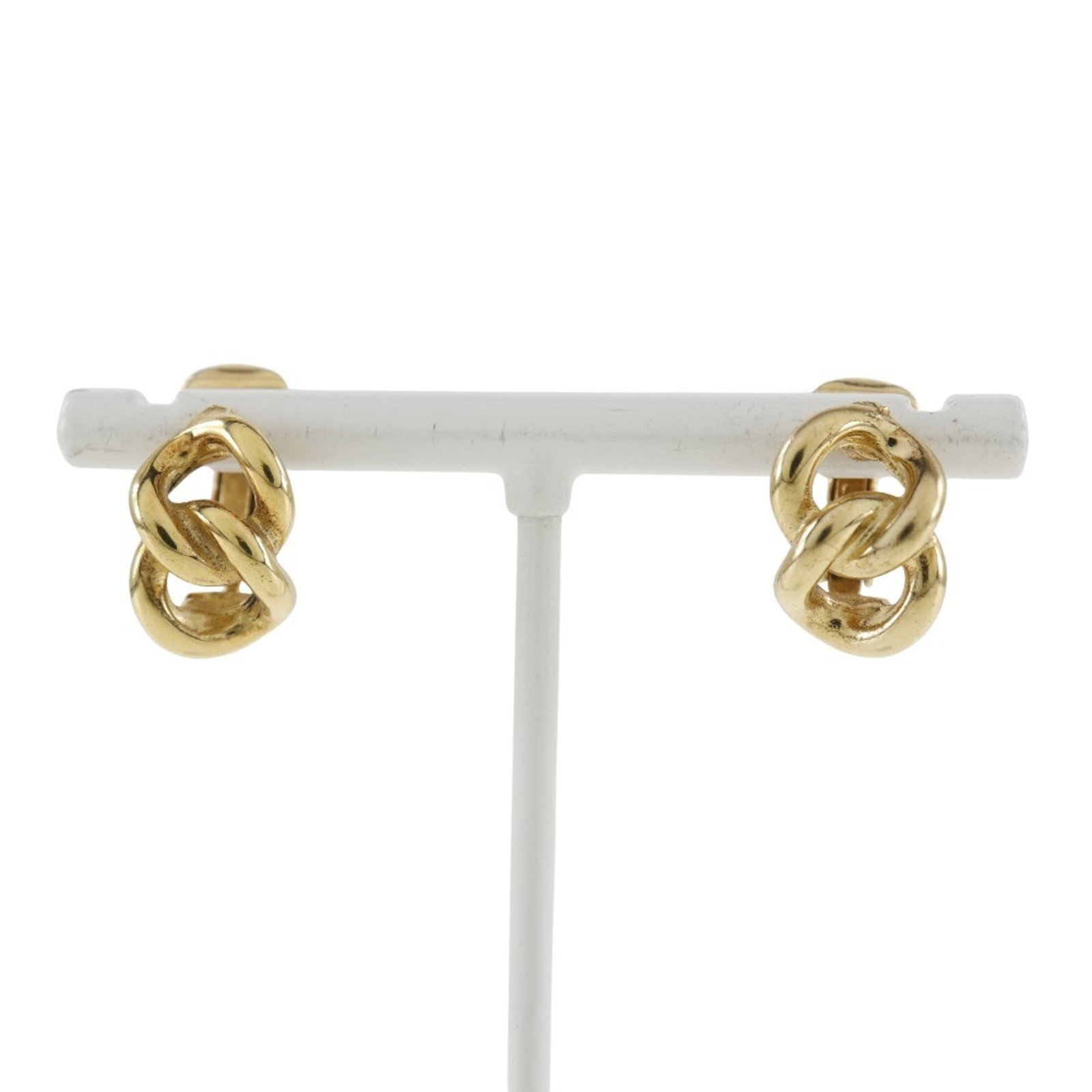 Clip earrings by Christian Dior: Clip earrings by Christian Dior Clip earrings by Christian Dior, crafted in gold and measuring 15.00mm x 11.00mm, showcase the brand's attention to detail with a sleek design that complements any