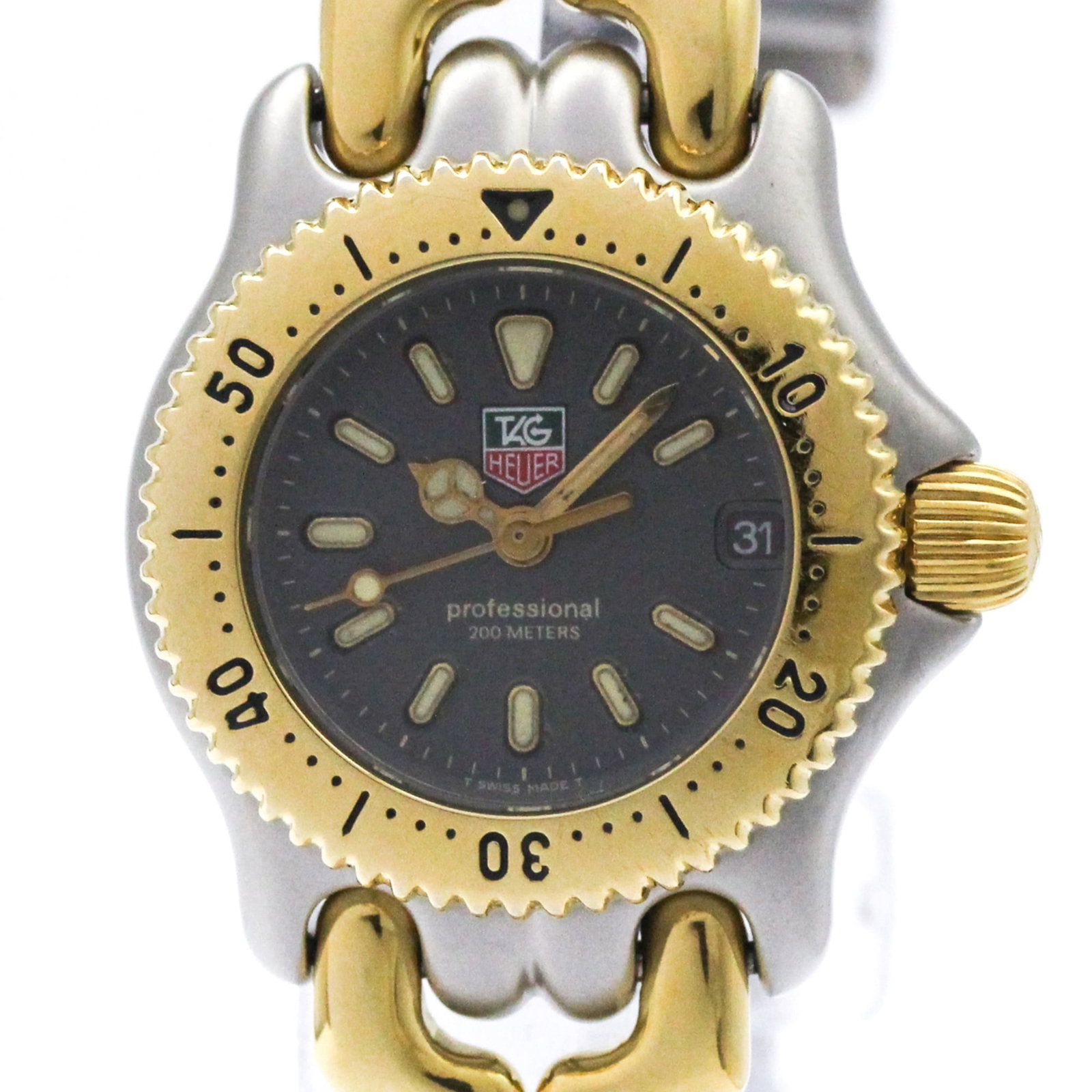 Wristwatch From Tag: Wristwatch From Tag Gold plated and stainless steel, the Tag Heuer S95.208 wristwatch boasts a sleek gray dial and a sophisticated design that makes it perfect for formal occasions. With its quartz