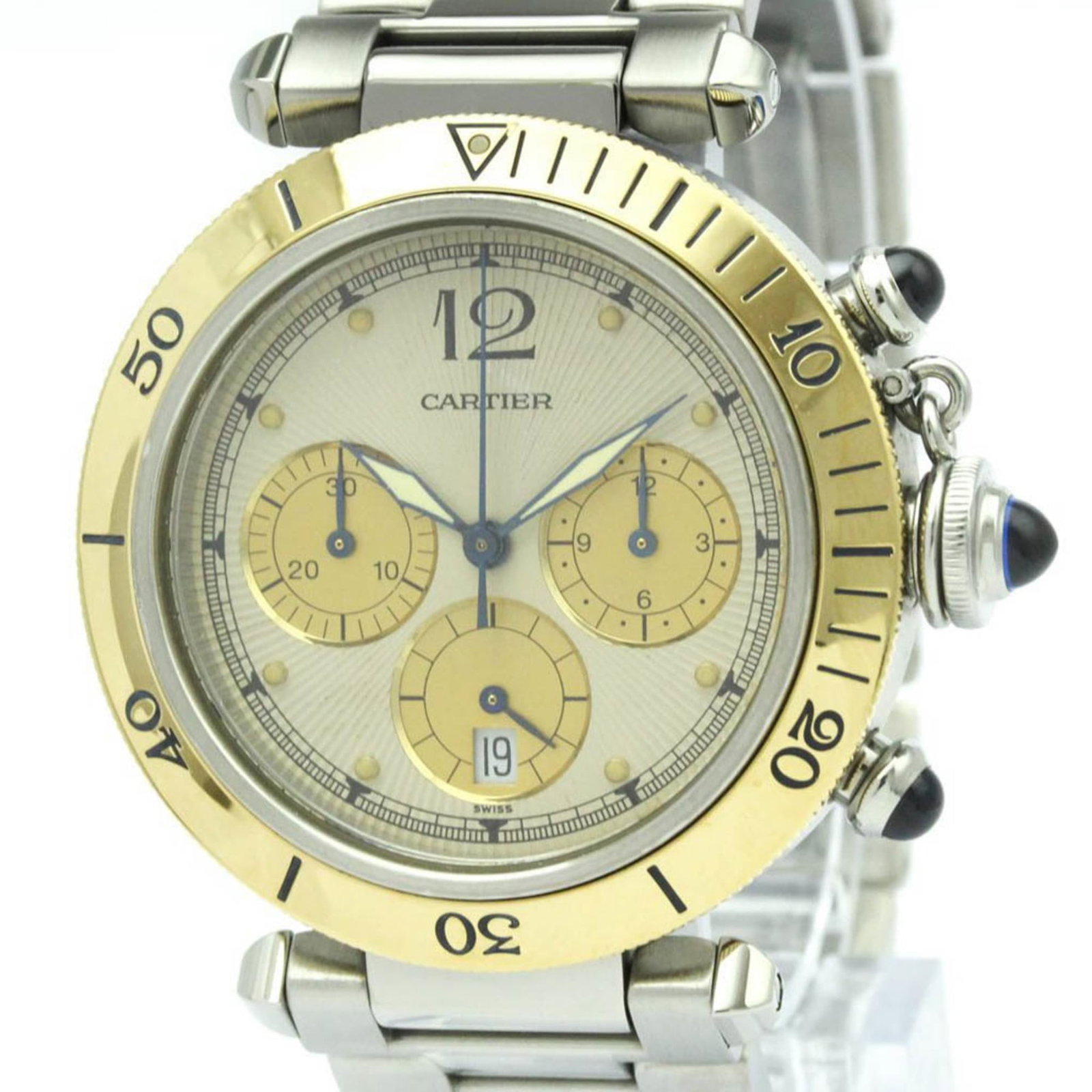 Wristwatch By Cartier: Wristwatch By Cartier Stainless steel and yellow gold (18K) blend in the Pasha watch, with a silver dial and quartz movement. This sporty timepiece boasts chronograph and date functions within its sle