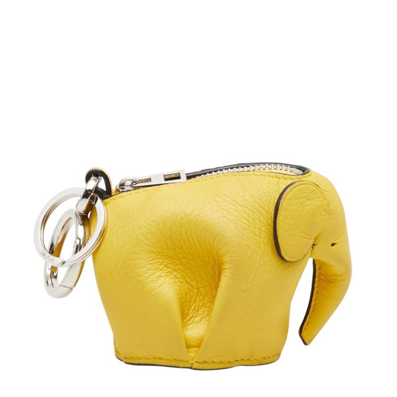 Handbag Charm Leather by Loewe: Handbag Charm Leather by Loewe Loewe Handbag Charm Leather bears a signature. Made from high-quality leather, it measures 75mm x 55mm x 50mm and features a bright yellow color. This charming