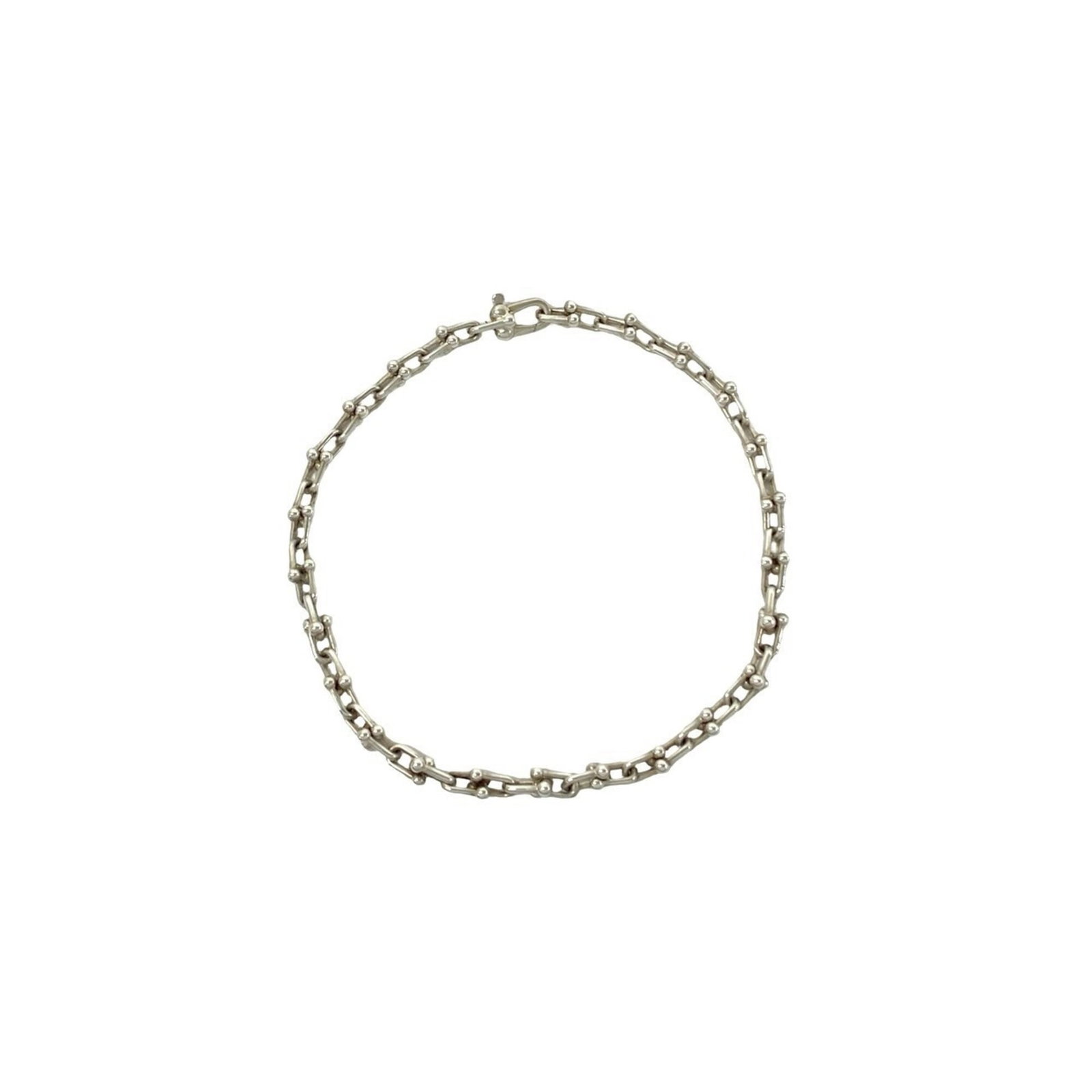 Silver link bracelet Tiffany: Silver link bracelet Tiffany Silver link bracelet Tiffany, made from high-quality silver 925 material, features a classic design with a length of 19.5cm / 7.67''. This elegant piece showcases the time