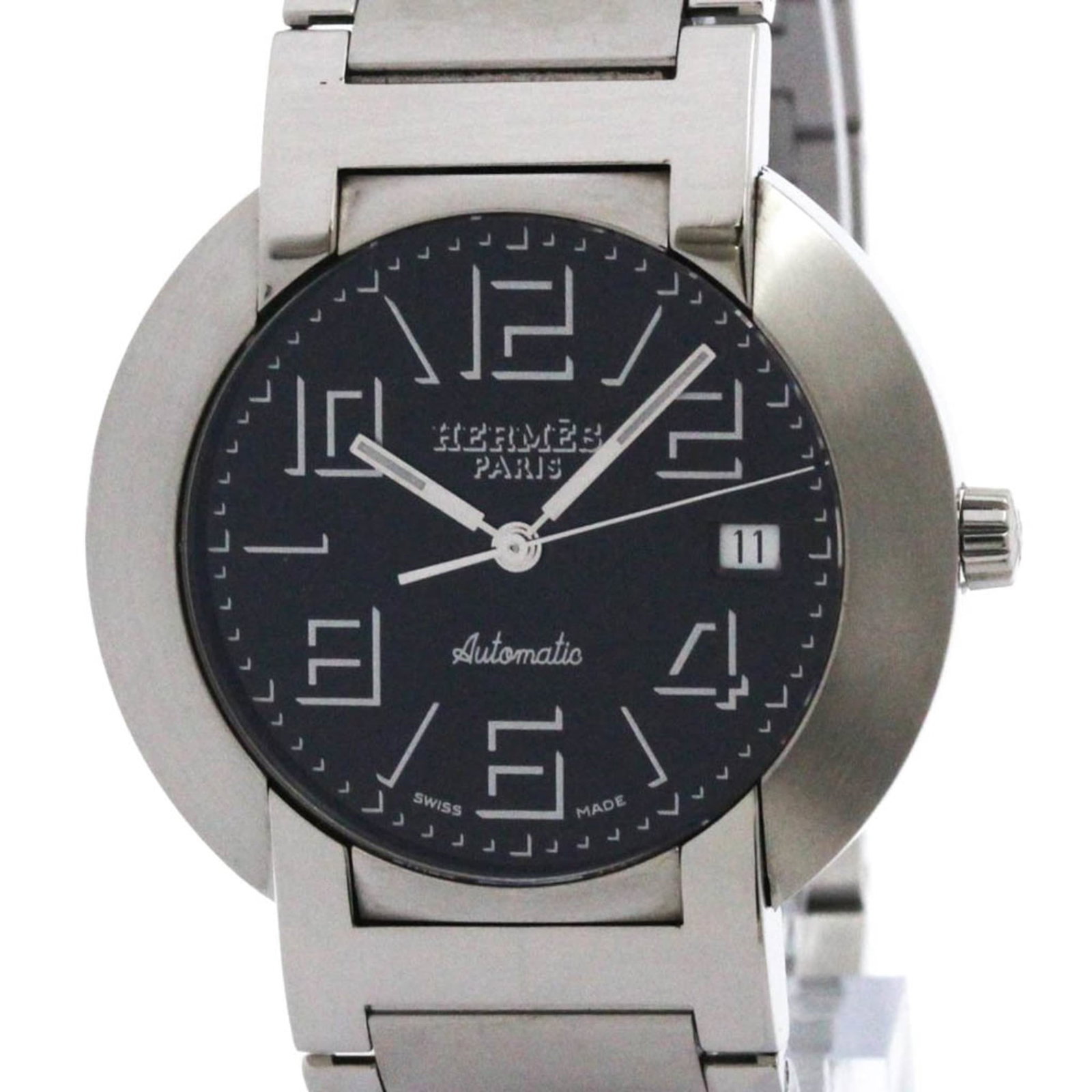 Hermes Wristwatch: Hermes Wristwatch Stainless steel case and band, the Hermes Nomade wristwatch boasts a sleek black dial. Powered by a self-winding automatic movement, this dress watch features date functionality and 