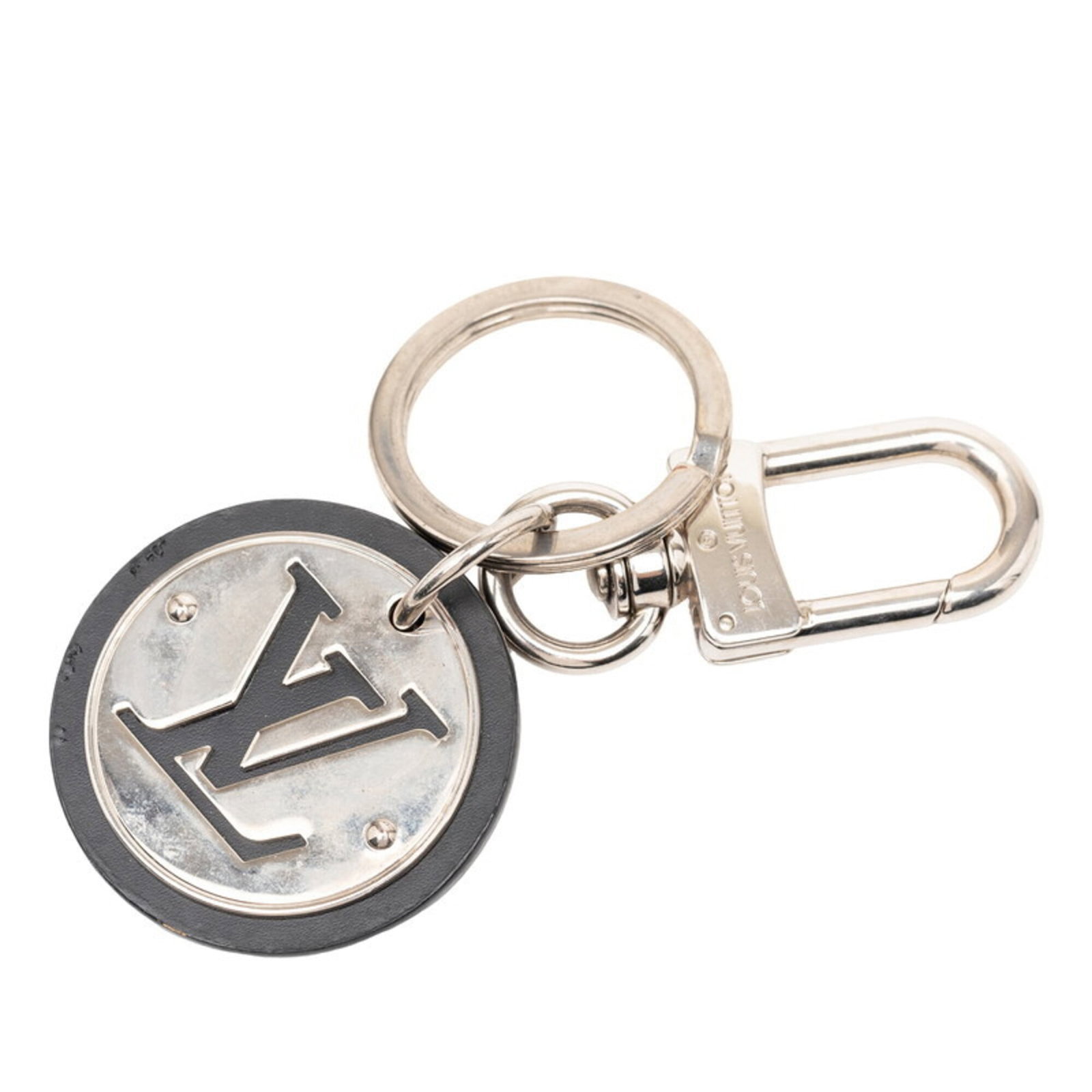 Handbag Metal Louis Vuitton: Handbag Metal Louis Vuitton Metal Louis Vuitton charm handbag with sleek black and silver details, measuring 4.33'' x 1.97''. This compact accessory boasts a sophisticated design that adds a touch of