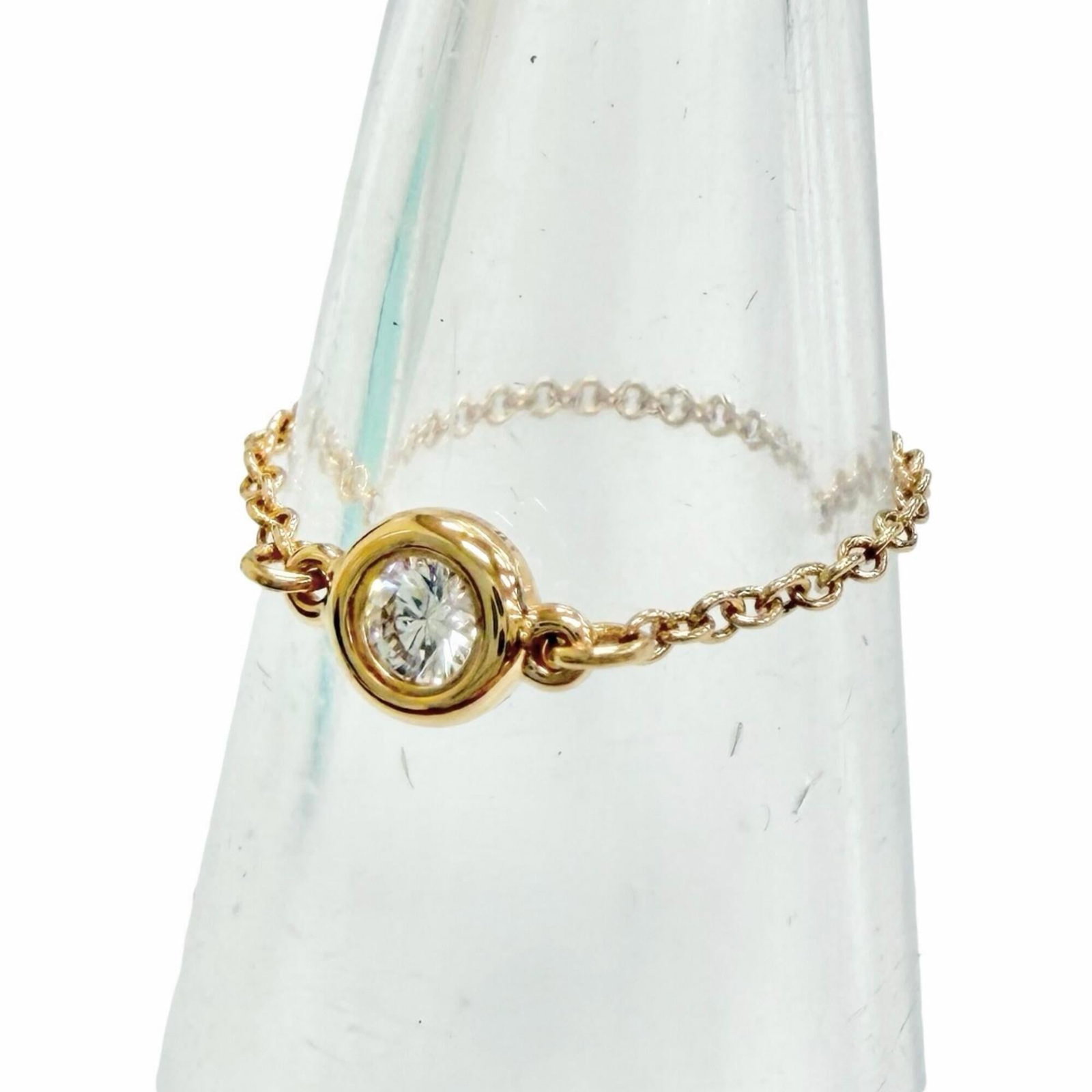 Pink Gold 18k Ring Tiffany: Pink Gold 18k Ring Tiffany Pink gold 18k ring from Tiffany, featuring a diamond stone. This band ring is available in US size 4 and Japanese size 7. Made from high-quality pink gold material. Item