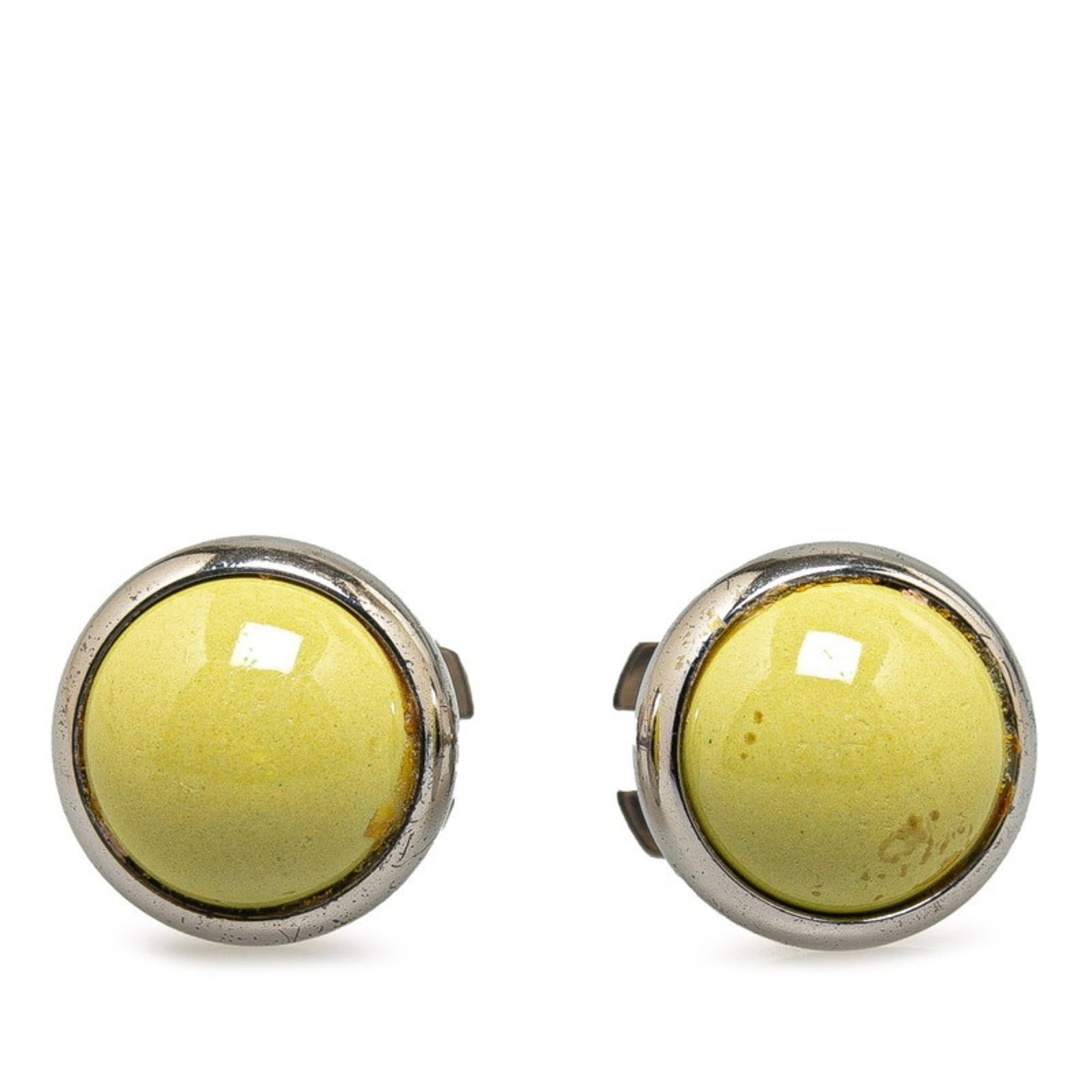 Metal earrings by Hermes Stud: Metal earrings by Hermes Stud Metal earrings by Hermes Stud, featuring a striking green color and sleek silver finish. Made from high-quality metal, these stud earrings boast a precise size of 10.80mm