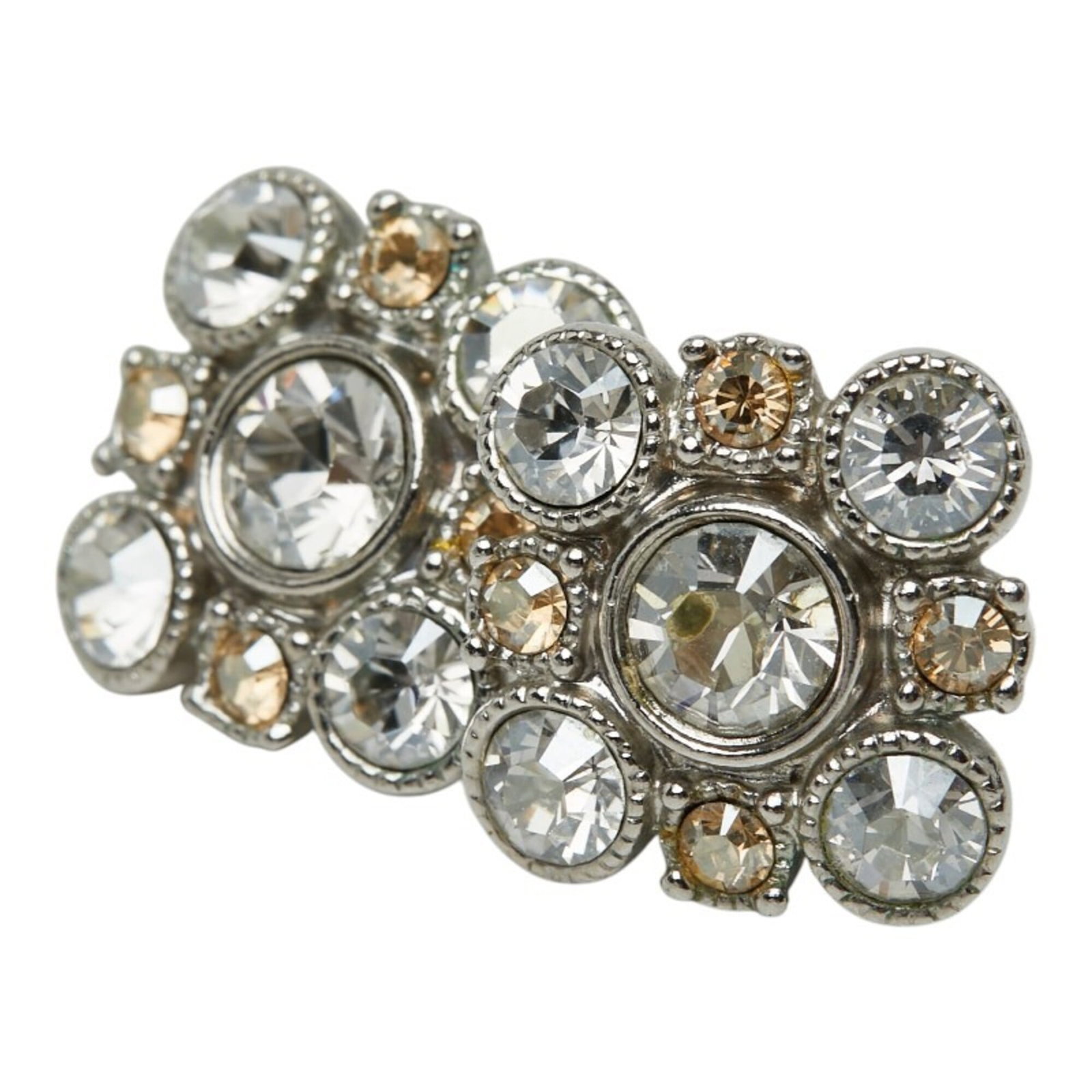 Metal Stud Chanel Earrings: Metal Stud Chanel Earrings Metal stud earrings from Chanel, crafted in silver. The studs measure 17.50mm x 17.70mm and have a thickness of 0.69'' x 0.70''. These metal stud earrings are made with