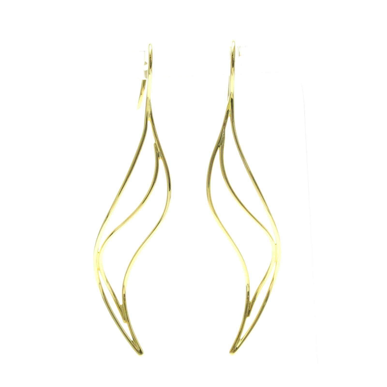 Tiffany Drop Earrings in Yellow Gold: Tiffany Drop Earrings in Yellow Gold Yellow gold Tiffany Wave earrings in 18K purity, featuring a sleek drop design with no stone. Weighing approximately 4.4g each and measuring 64mm x 13.80mm, these