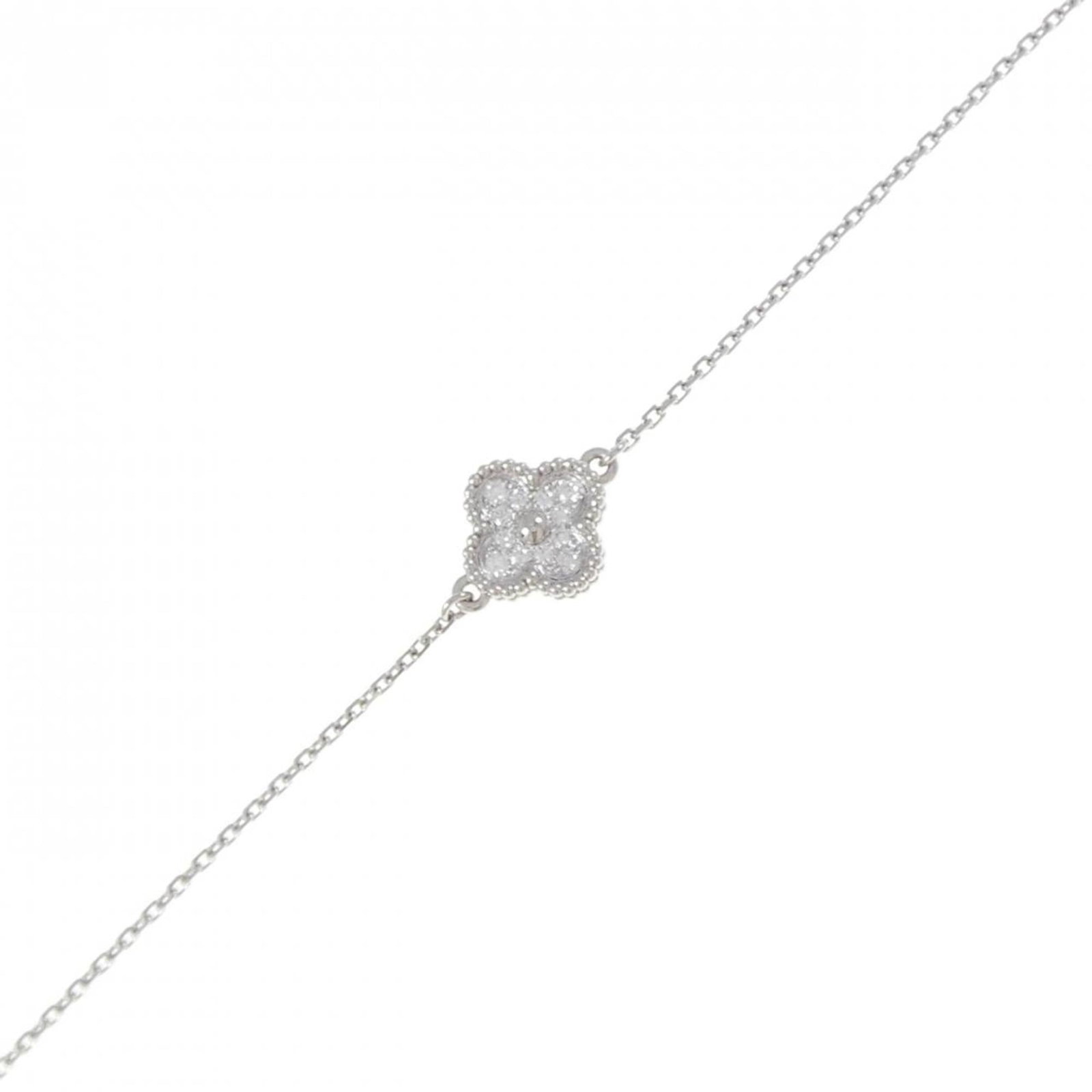 Van Cleef & Arpels Charm Bracelet White Gold (18K): Van Cleef & Arpels Charm Bracelet White Gold (18K) Van Cleef & Arpels Charm Bracelet White Gold (18K) - A timeless piece featuring diamond accents, crafted from high-quality white gold. This elegant