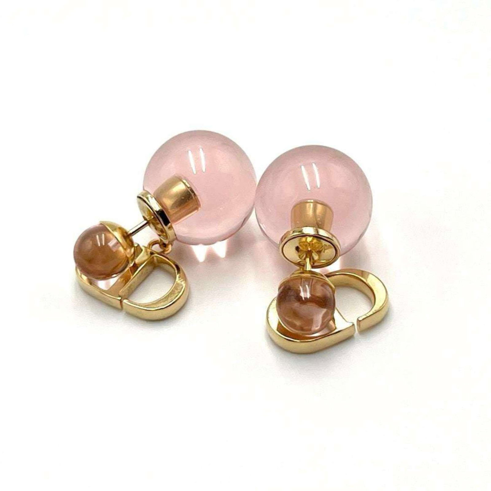Metal Plastic Dior Drop Earrings: Metal Plastic Dior Drop Earrings Metal Plastic Dior Drop Earrings are crafted from metal and plastic, making them a unique combination of materials. The earrings feature a distinctive drop design,
