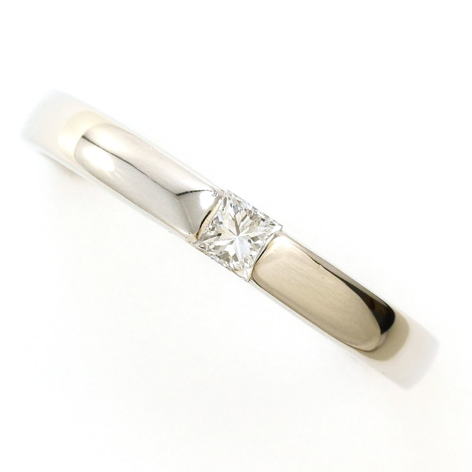 Ring Band Platinum Unbranded 900: Ring Band Platinum Unbranded 900 Platinum band ring with a diamond stone, weighing 0.10 carats, set in a 2.5mm wide platinum band, available in US size 5.5 and Japanese size 10. This platinum ring