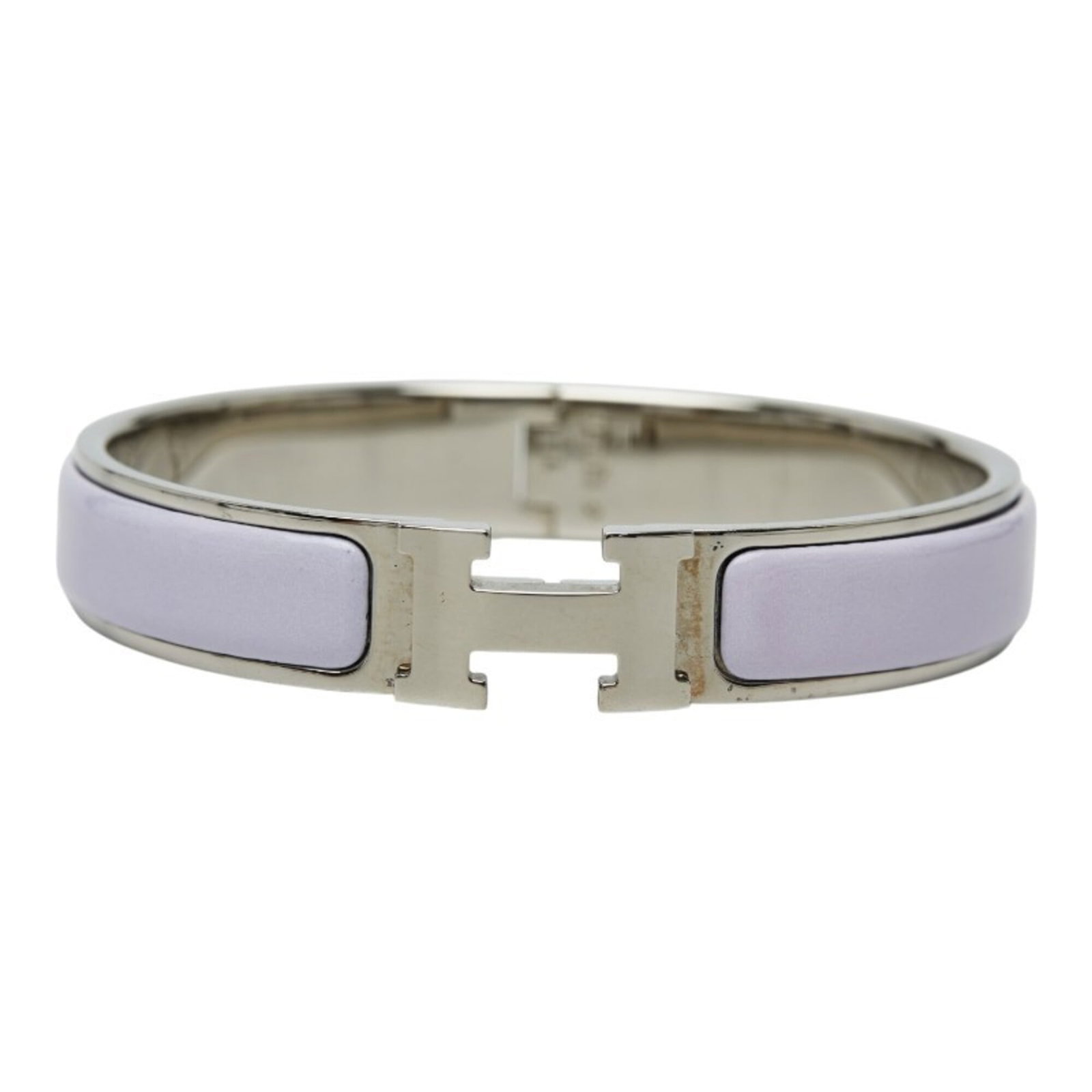 Metal enamel charm bracelet by Hermes: Metal enamel charm bracelet by Hermes Purple enamel charm bracelet by Hermes, featuring intricate metal details and a sleek silver finish. Measuring 17cm in length with a subtle width of 1.1cm, this e