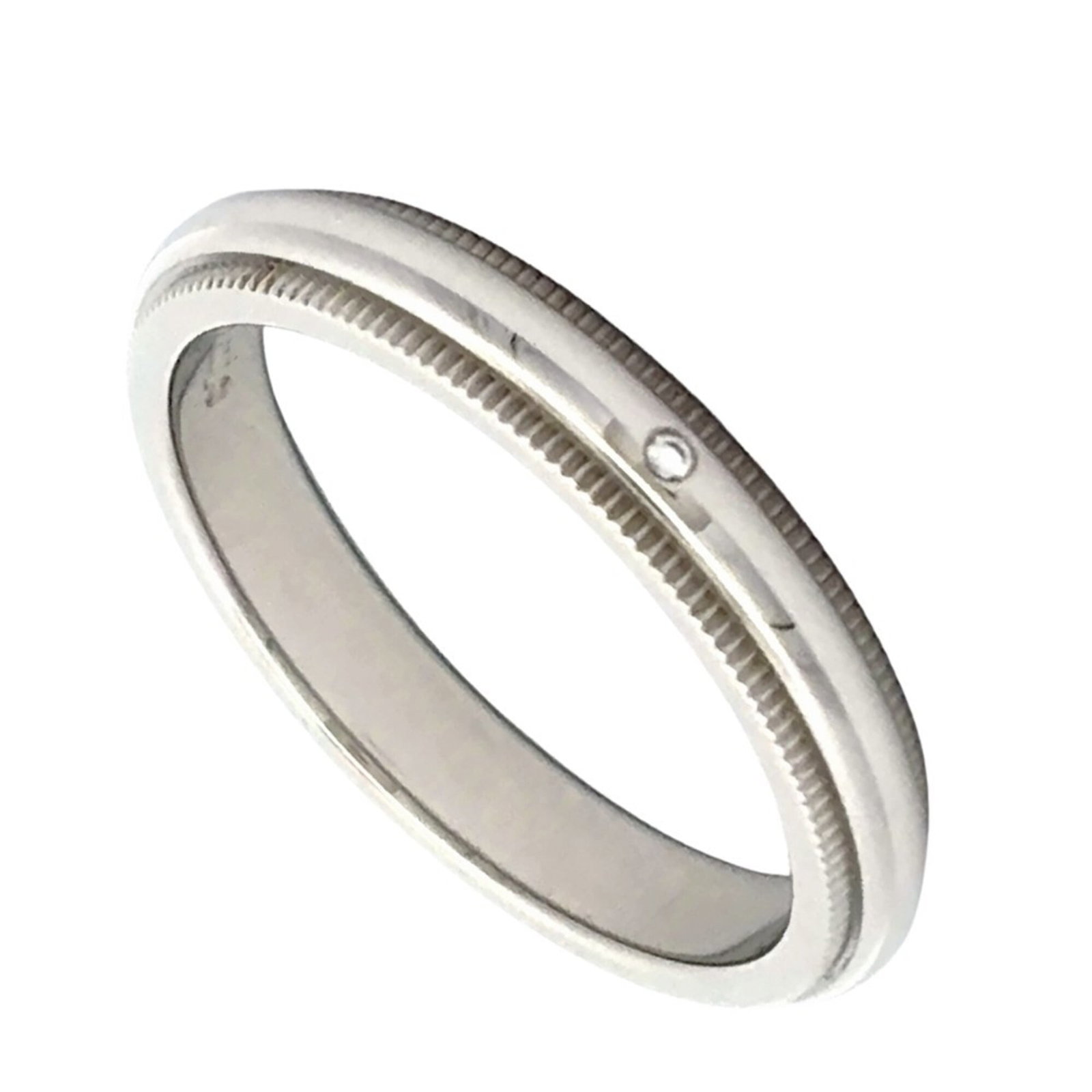 Tiffany platinum ring band: Tiffany platinum ring band Platinum ring band from Tiffany, featuring a diamond stone and available in US size 6 and JP size 11. The platinum material provides durability and a sleek finish, while