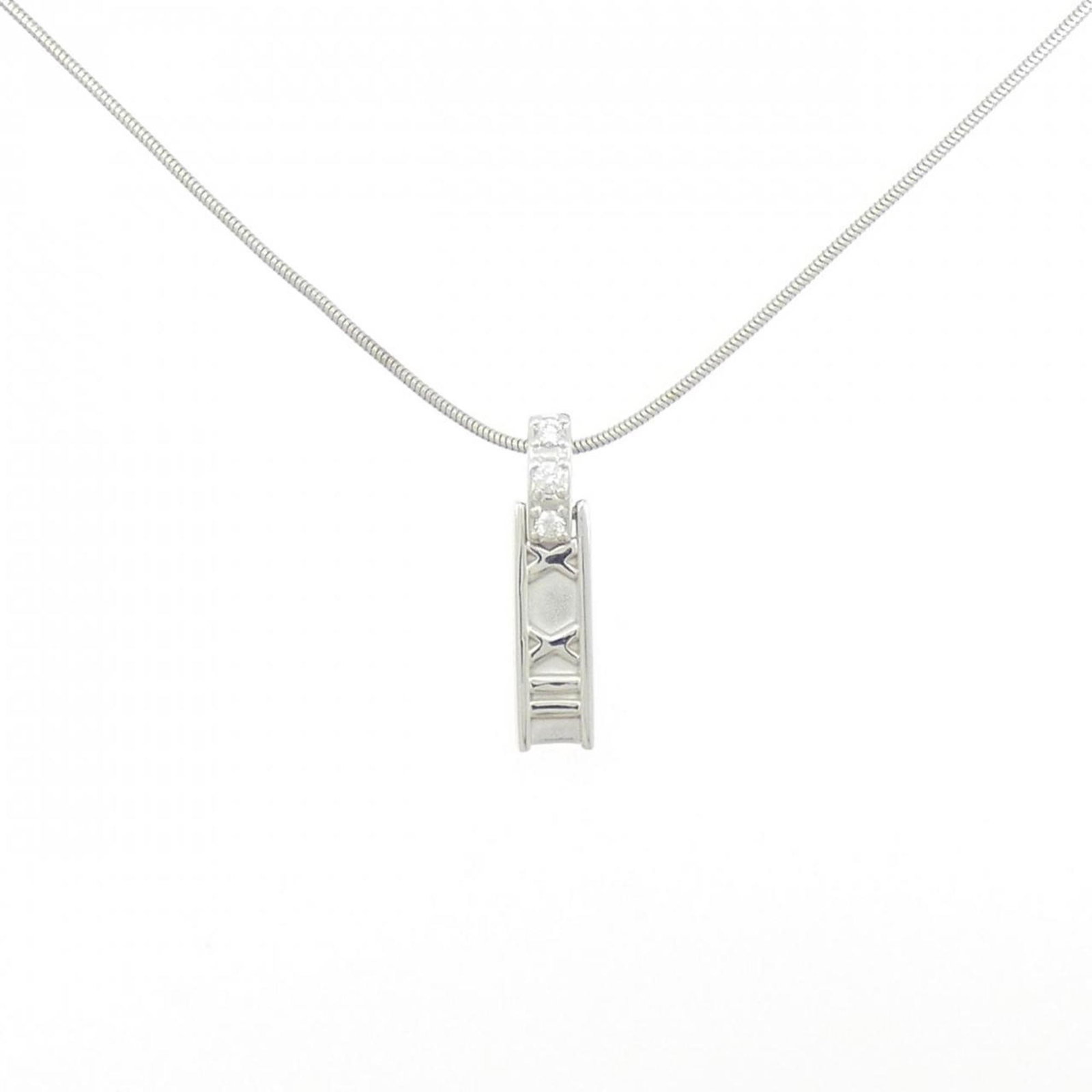 Atlas Necklace by Tiffany: Atlas Necklace by Tiffany White gold (18K) pendant with a diamond stone, set in an elegant Atlas Necklace. The necklace features a 42 cm circumference and measures 21.9mm x 5.2mm. This Tiffany piece