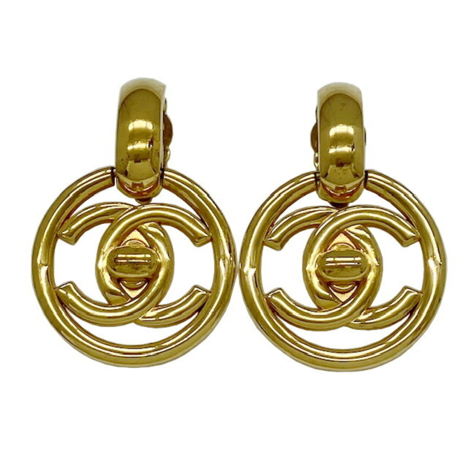 Metal clip earrings by Chanel: Metal clip earrings by Chanel Metal clip earrings by Chanel, featuring a gold finish and sleek design. Made from high-quality metal, these earrings showcase a classic style that exudes luxury. With