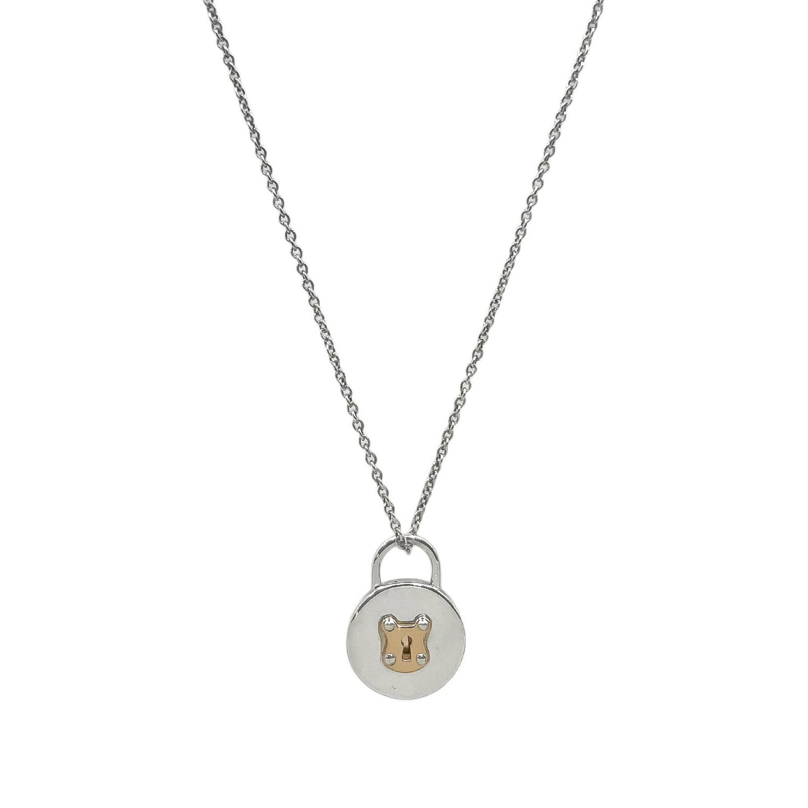 Tiffany women's silver round key combination necklace pendant sv925: Tiffany women's silver round key combination necklace pendant sv925 Silver round key combination necklace pendant from Tiffany, featuring a 12mm x 9mm design in 925 silver and 18K yellow gold. This