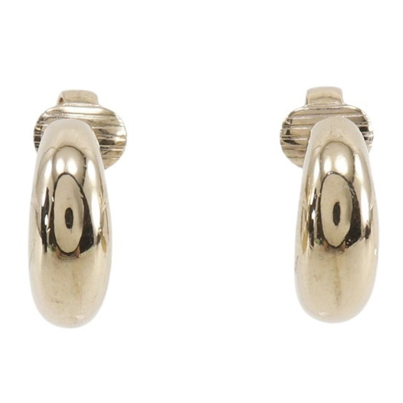 Clip earrings by Christian Dior: Clip earrings by Christian Dior Clip earrings by Christian Dior, crafted in gold with precise measurements of 16.00mm x 6.00mm and weighing 5.8g. The elegant design makes a statement with its sleek