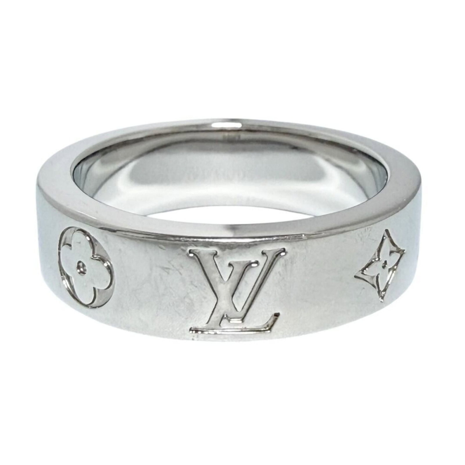 Ring Metal Louis Vuitton Band: Ring Metal Louis Vuitton Band Silver Louis Vuitton band ring, made from metal and available in US size 8.5 and JP size 17. The item bears a signature, made by the renowned Italian luxury brand Louis