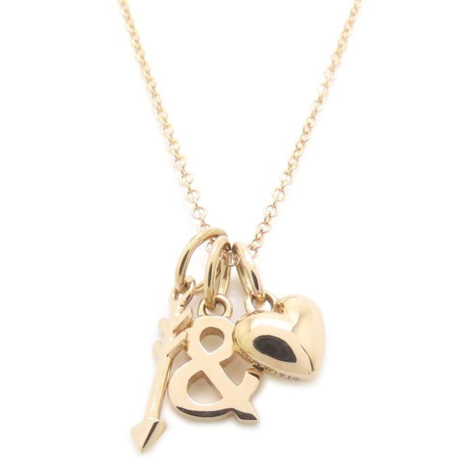Women's Heart Charm Necklace 18Kpg from Tiffany & Co.: Women's Heart Charm Necklace 18Kpg from Tiffany & Co. Pink gold (18K) necklace with a heart charm from Tiffany & Co., featuring a delicate design and a comfortable fit for women. The necklace