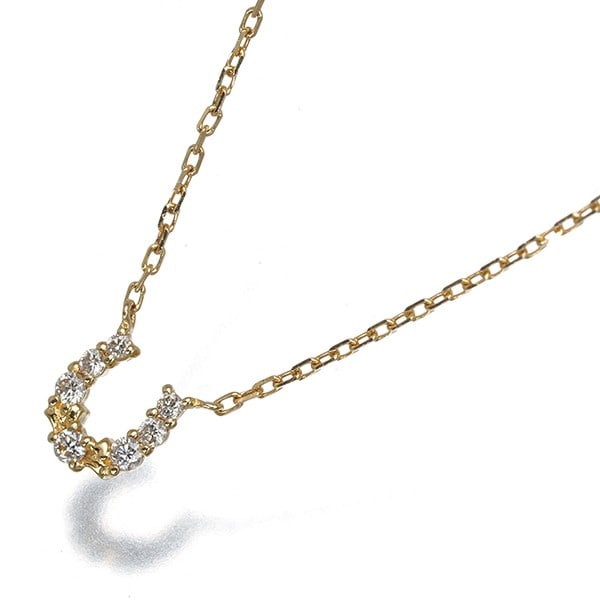 Necklace diamond 0.05ct horseshoe 18k yellow gold: Necklace diamond 0.05ct horseshoe 18k yellow gold 18k yellow gold necklace features a natural diamond pendant in the shape of a horseshoe, weighing a total of 0.05ct. The pendant measures 5.3 x 5.0mm 