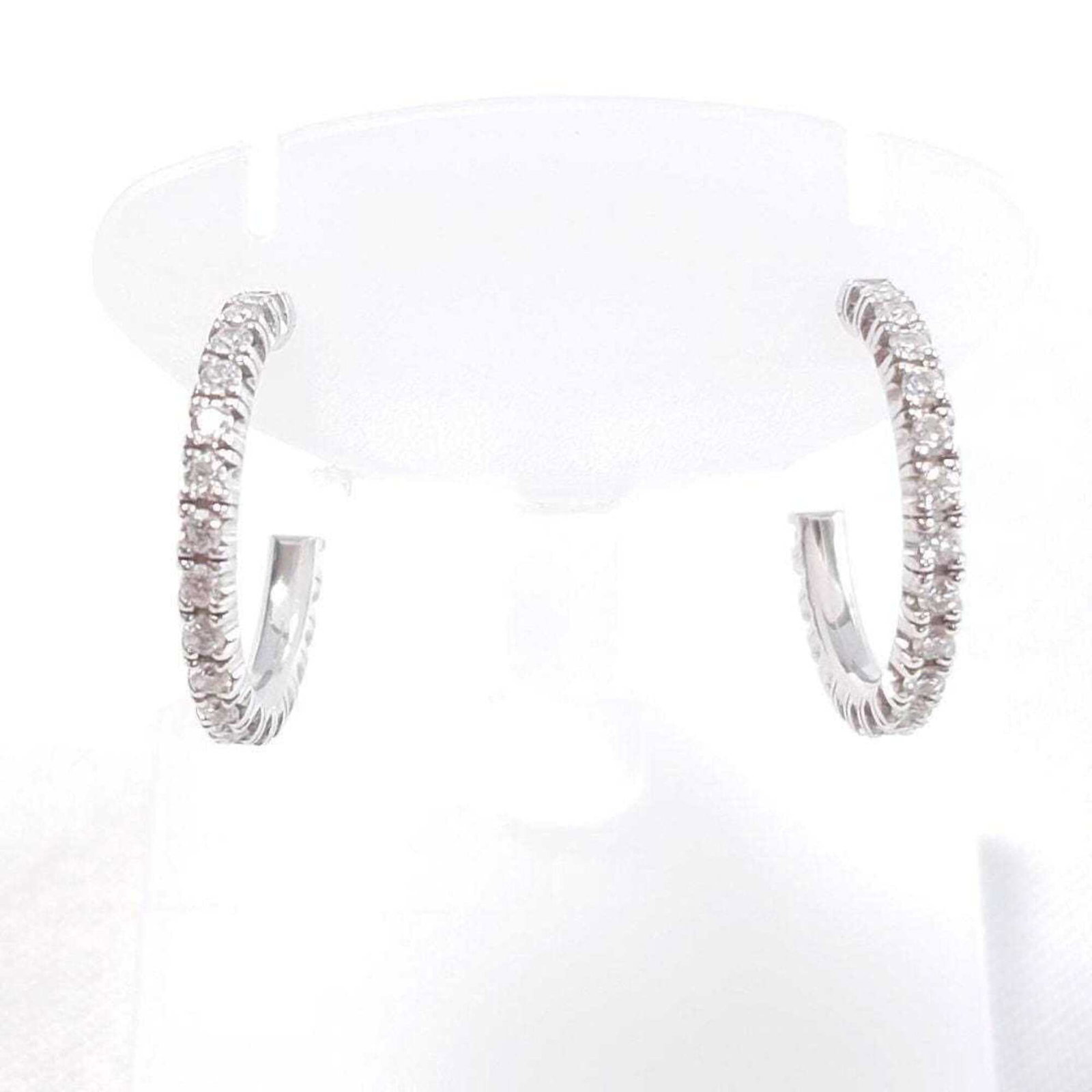 Cartier Half Hoop Earrings White Gold (18K): Cartier Half Hoop Earrings White Gold (18K) Cartier's half hoop earrings shine in white gold (18K), measuring 14.00mm x 1.80mm / 0.55'' x 0.07''. The sleek design features a subtle width, making them