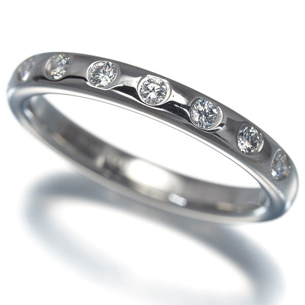 Tiffany&Co. Ring Diamond Stacking Band 8P Pt 950: Tiffany&Co. Ring Diamond Stacking Band 8P Pt 950 Tiffany&Co.'s Stacking Band by Elsa Peretti features a natural diamond set in platinum, creating a timeless and elegant design. The band's 950