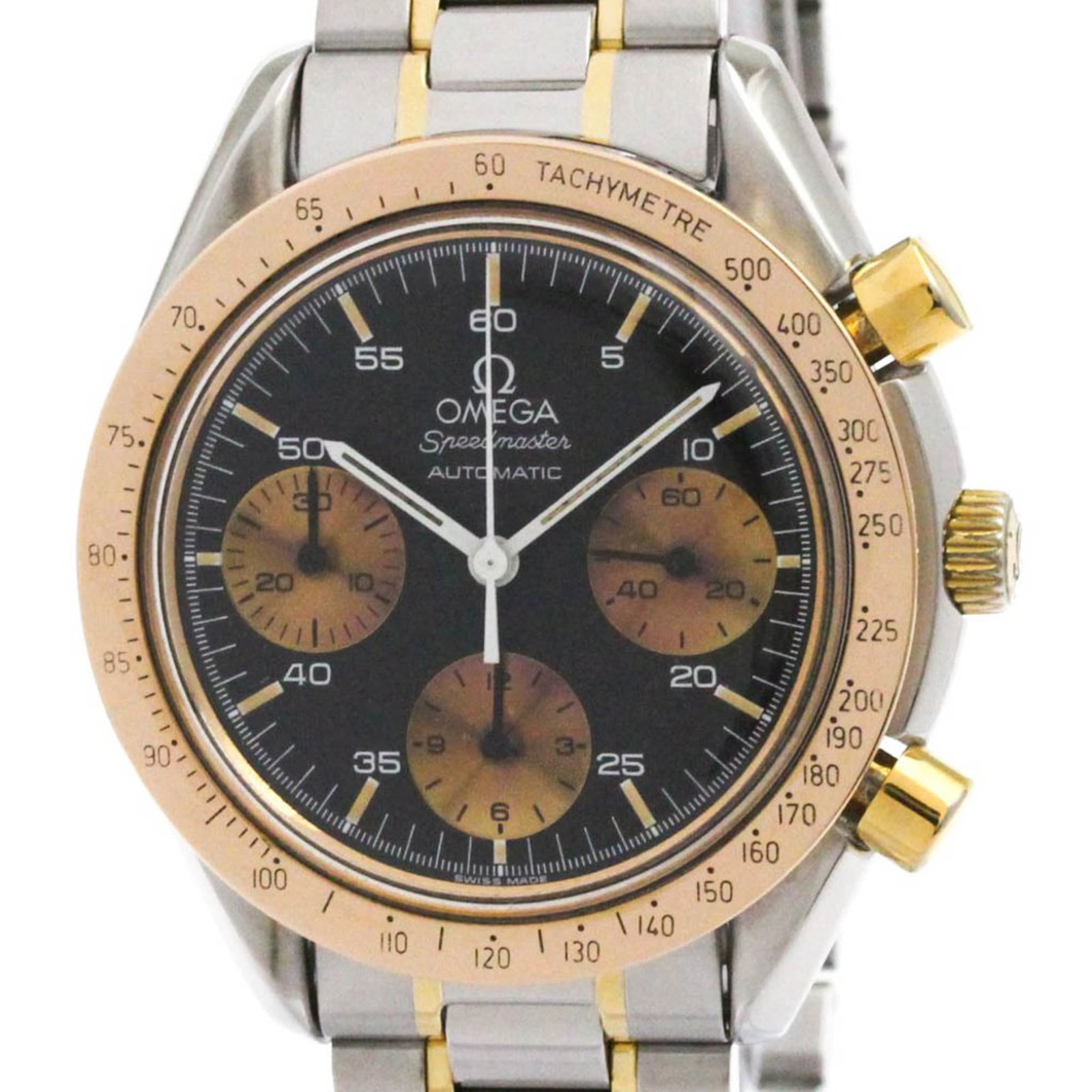 Wristwatch of Omega: Wristwatch of Omega Stainless steel and yellow gold (18K) combine in the sleek design of this Omega Speedmaster watch, featuring a black dial and self-winding automatic movement. The sporty style and